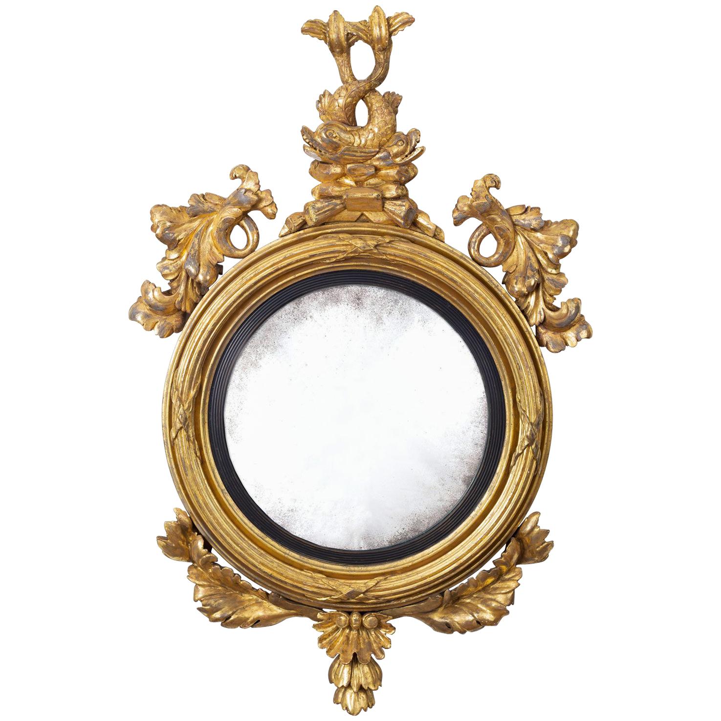 Regency Giltwood Convex Mirror with Dolphins, circa 1810 For Sale