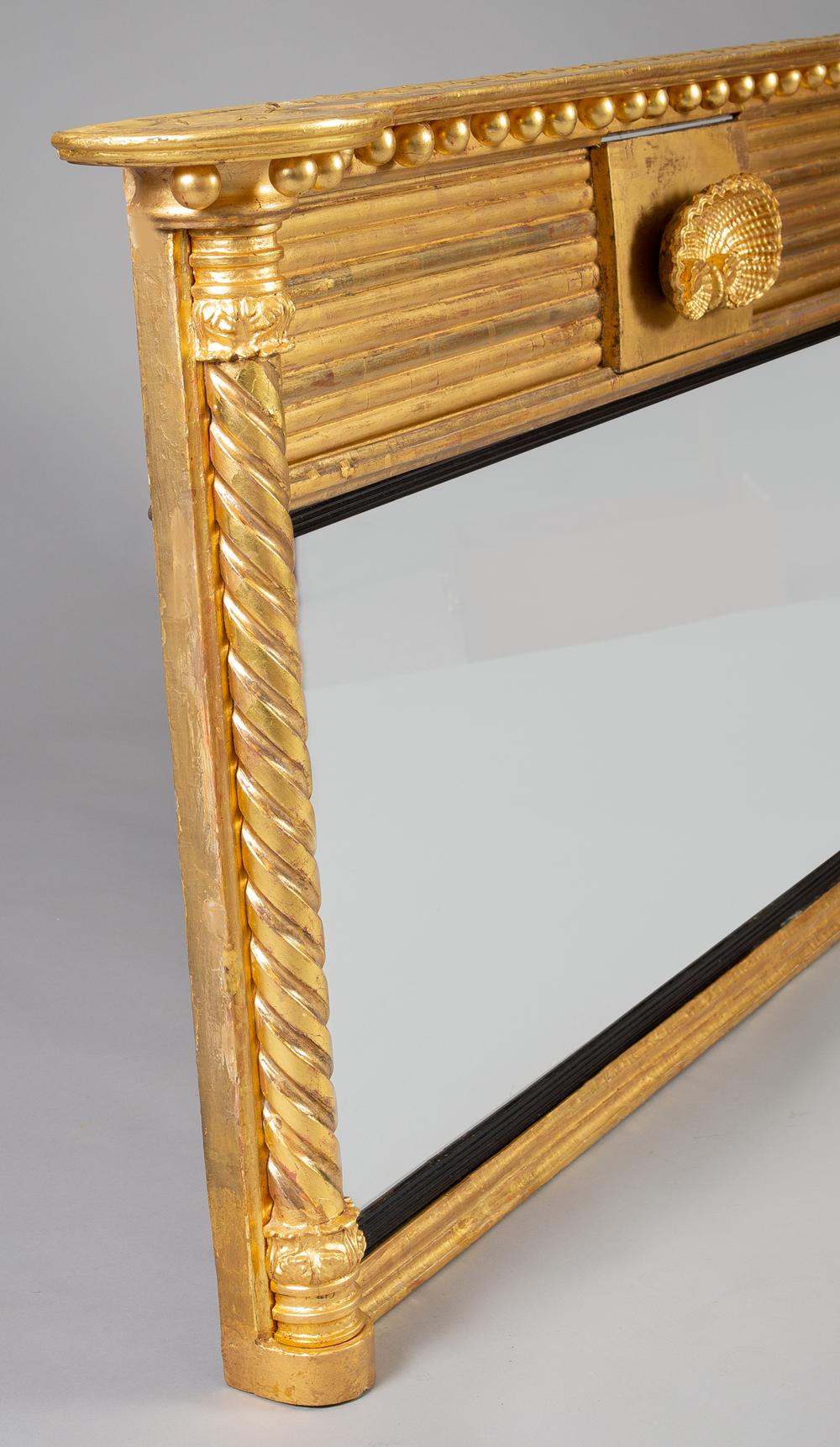 Carved Regency Giltwood Ovemantle Mirror For Sale