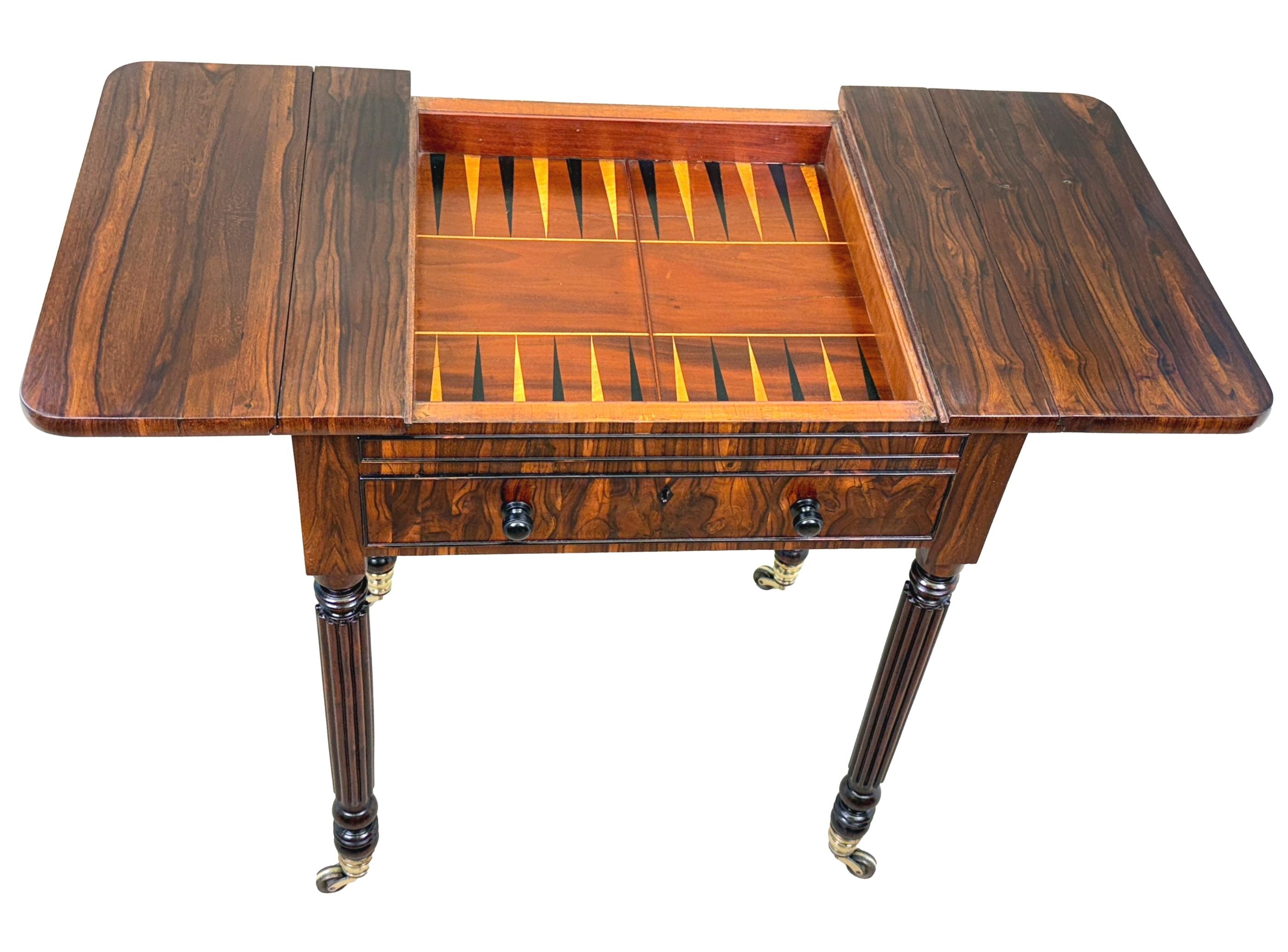 A Very Fine Quality Early 19th Century, Regency Period, Goncalo Alves Games Table, Having Superbly Figured Drop Flap Top, With Removable, Reversible, Sliding Top Inlaid With Chess Board, Enclosing Backgammon Board To Interior, Over One Frieze Drawer