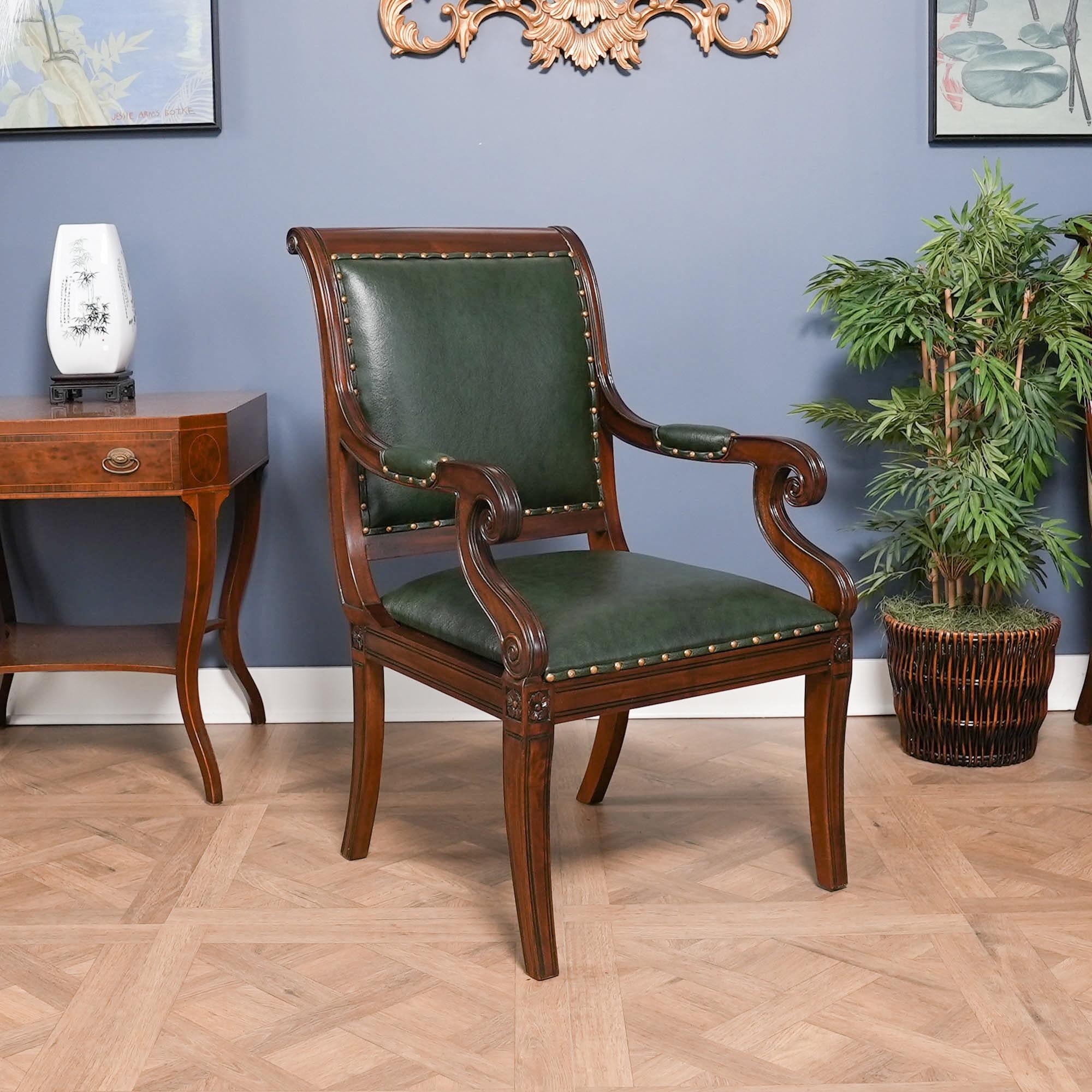 The Niagara Furniture Regency Green Leather Arm Chair with full grain leather upholstery combines a super simple design with sweeping lines and finely executed details to help make this great quality chair very popular. Finely hand carved details on