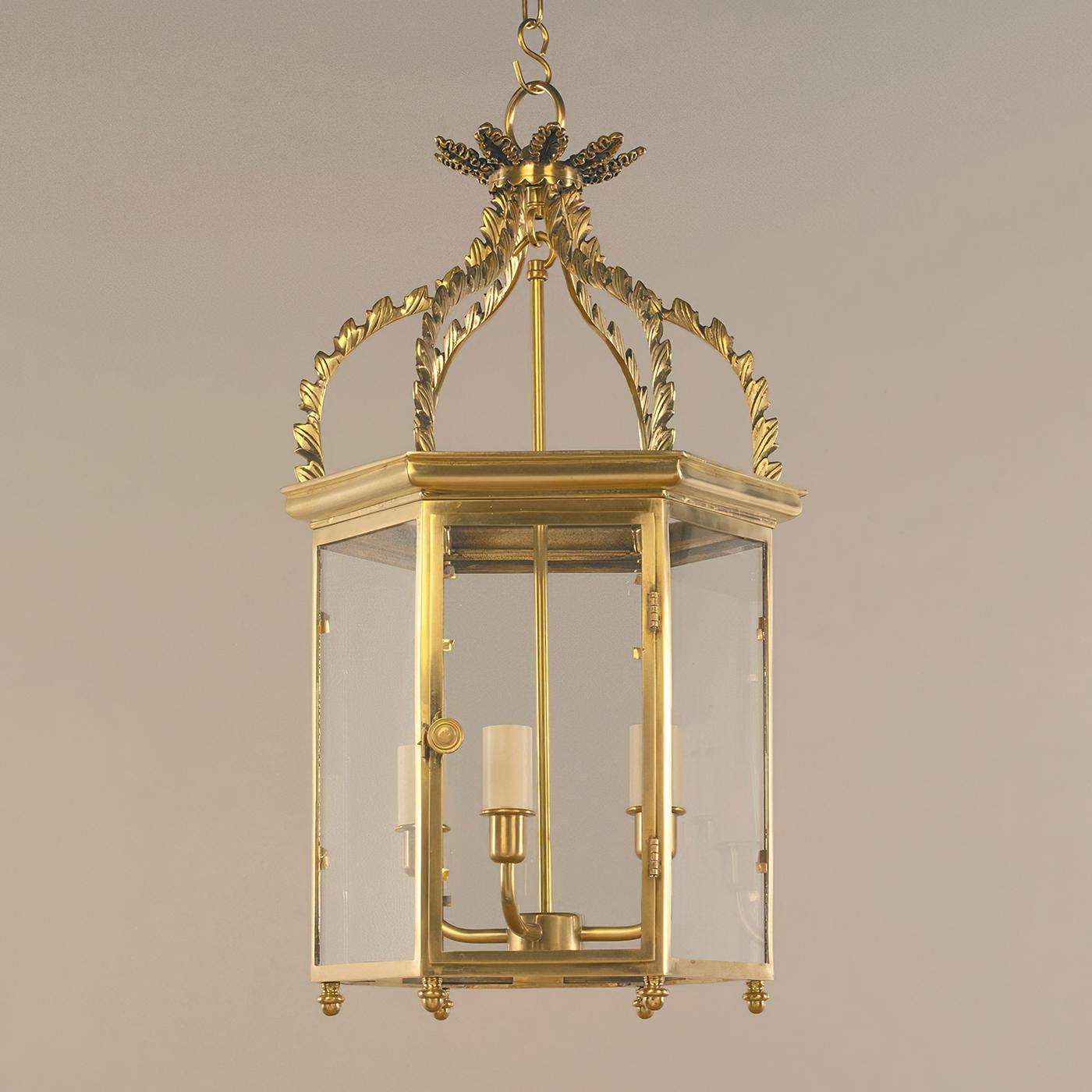 Regency hall lantern. This classic lantern is based on a 19th-century six-sided original. Superbly cast, it demonstrates a range of techniques, from the finely crafted frame to the ornately decorative upper section, finished with feathered detailing