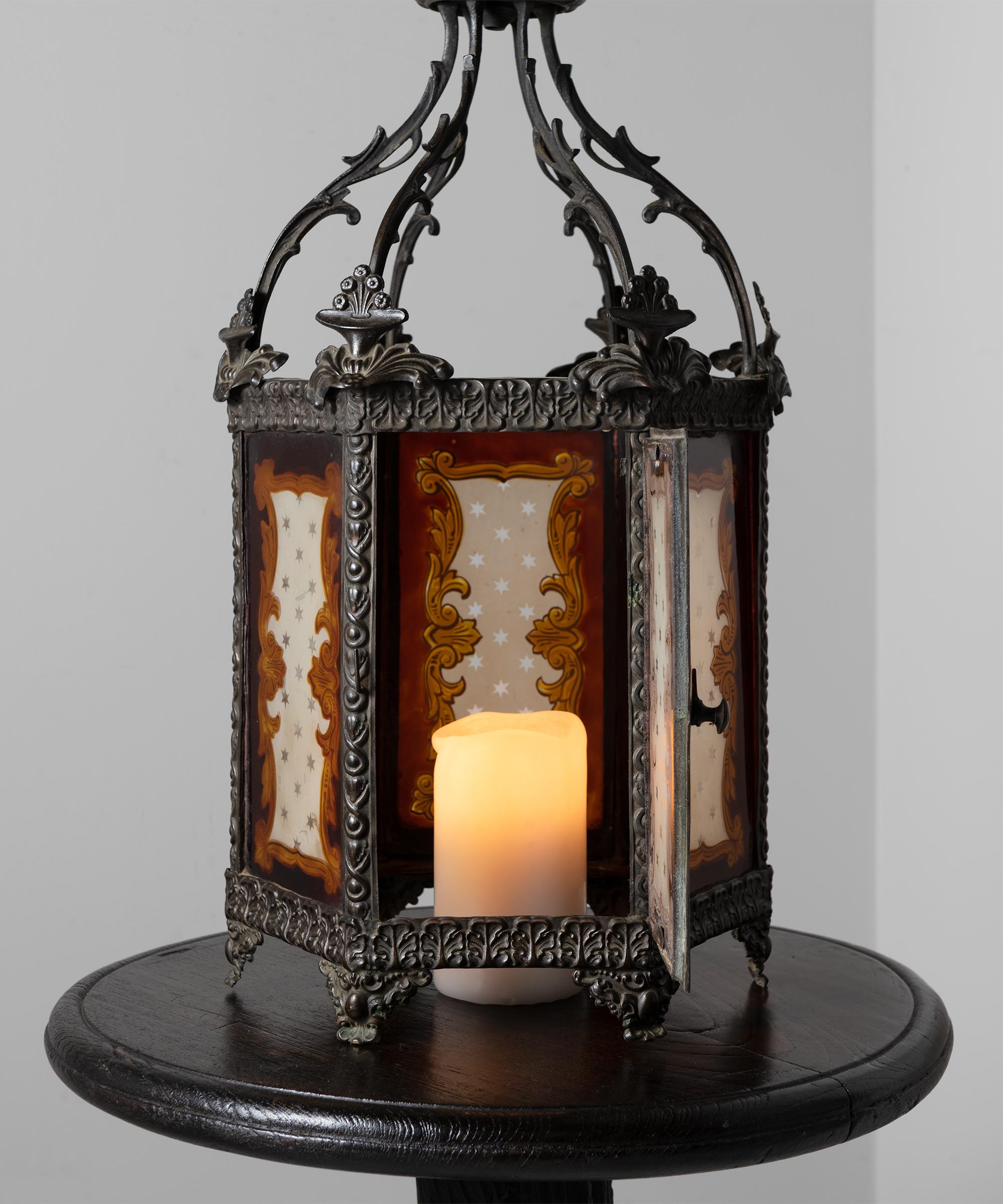 Hexagonal Gasolier lantern in cast and patented brass with original hand painted colored glass.




Measures: 11