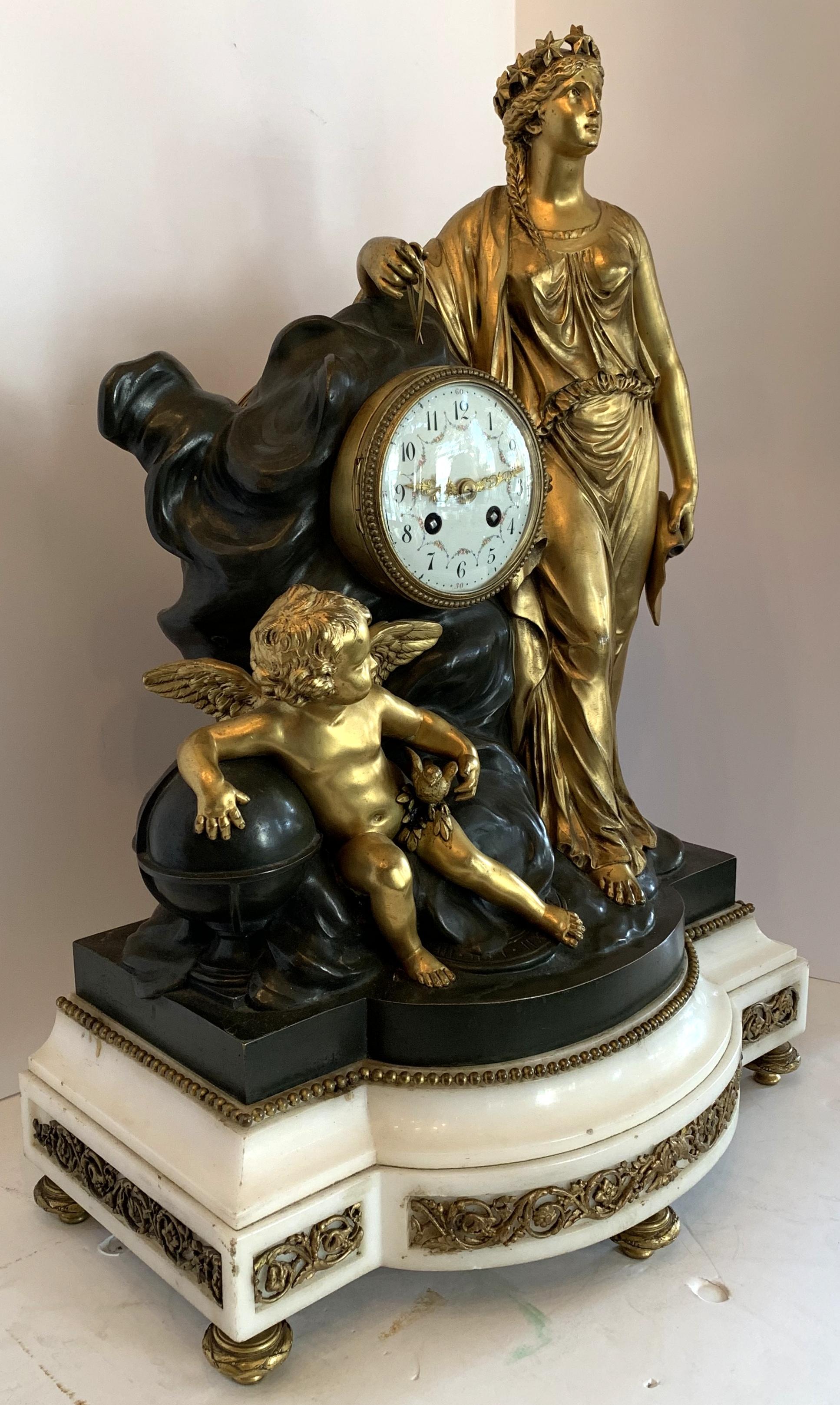 A Regency monumental doré and patinated bronze ormolu-mounted on marble base clock adorned with figures of a Cherub and a Maiden, extremely large and heavy. Back cover is missing, not currently working.
Provenance: Purchased From Christie's New