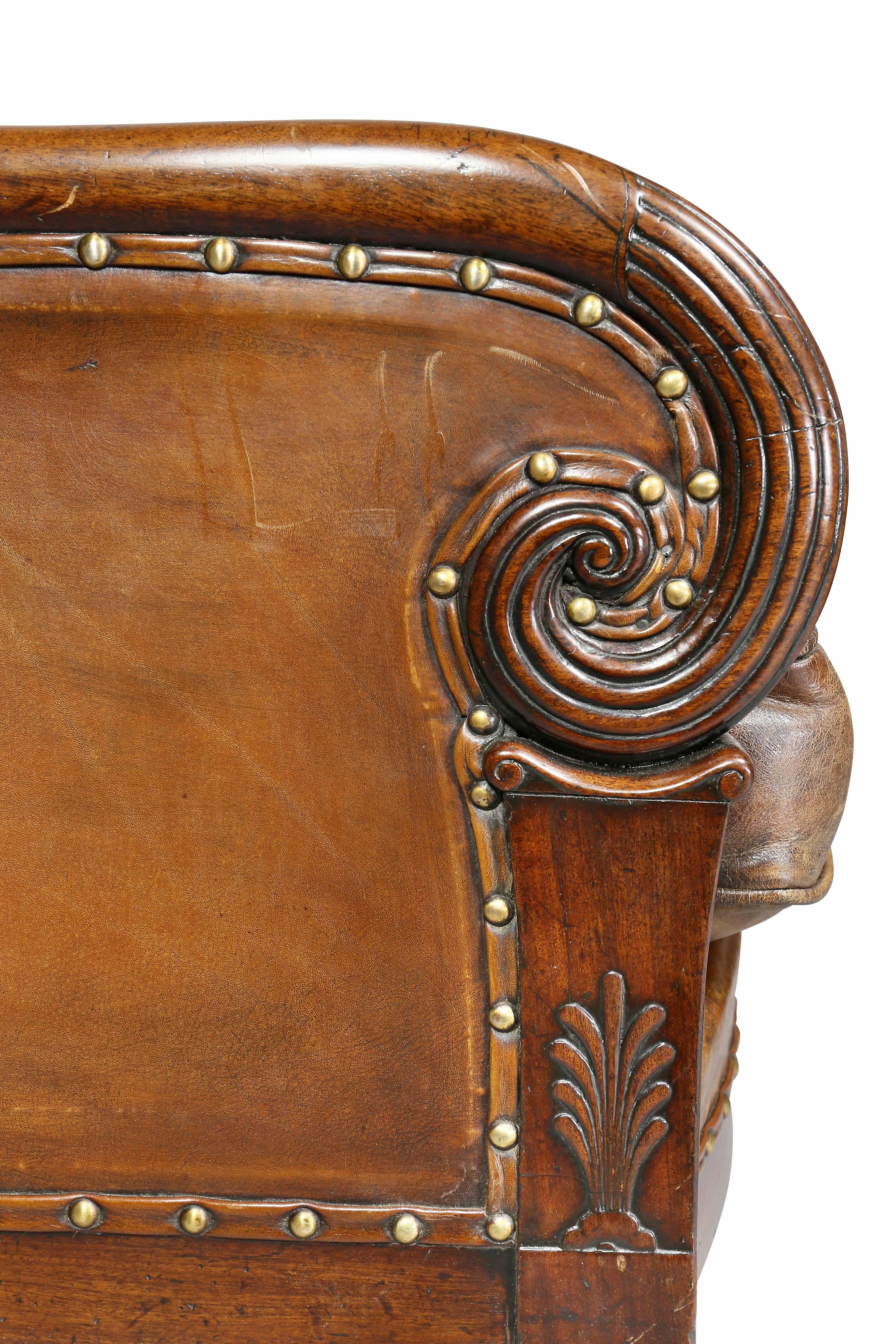 English Regency Mahogany and Leather Upholstered Bergere