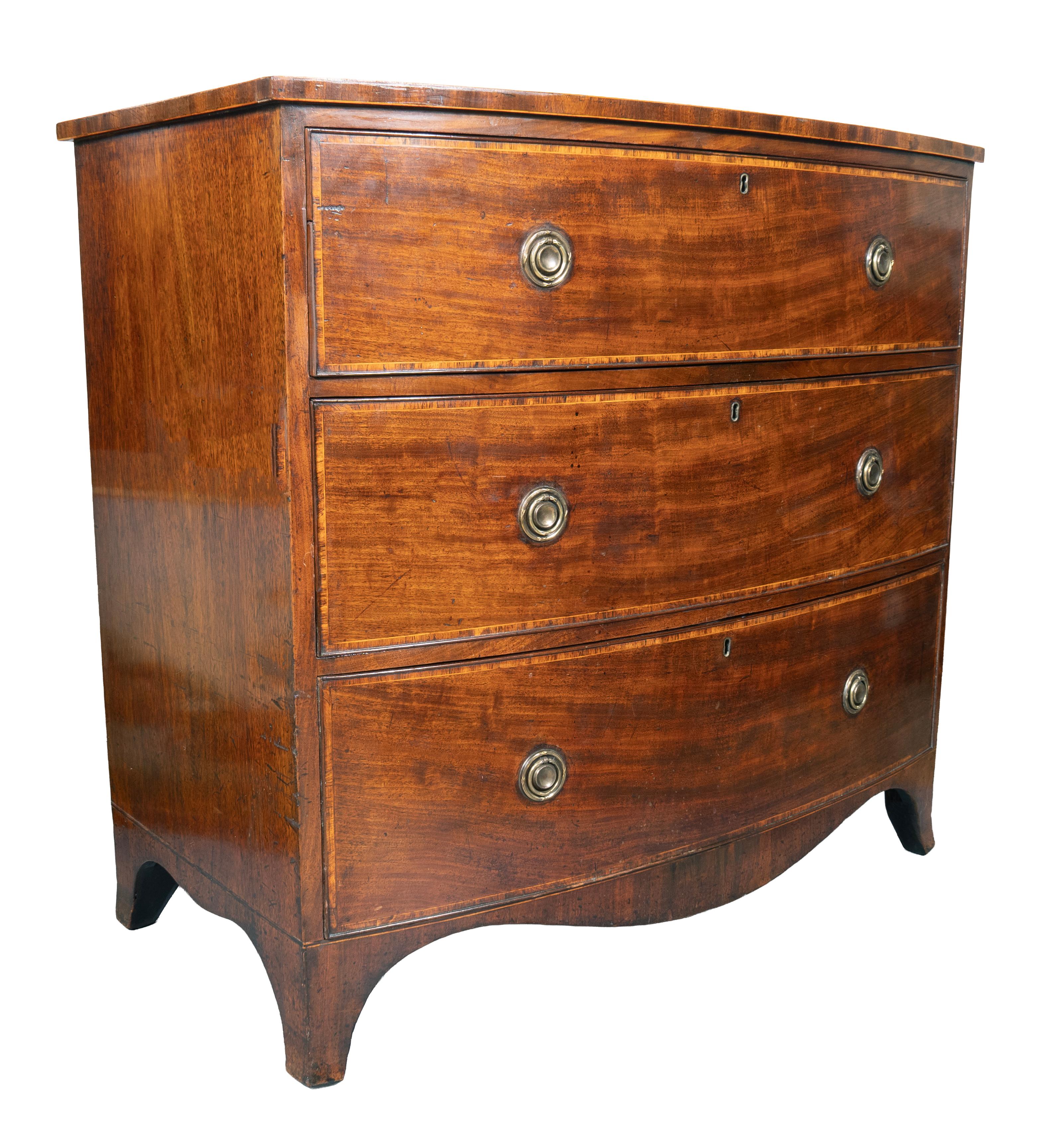 Rectangular bow front with banded top edge and drawer edges. Three conforming drawers with round brass ring handles. Splayed feet.
