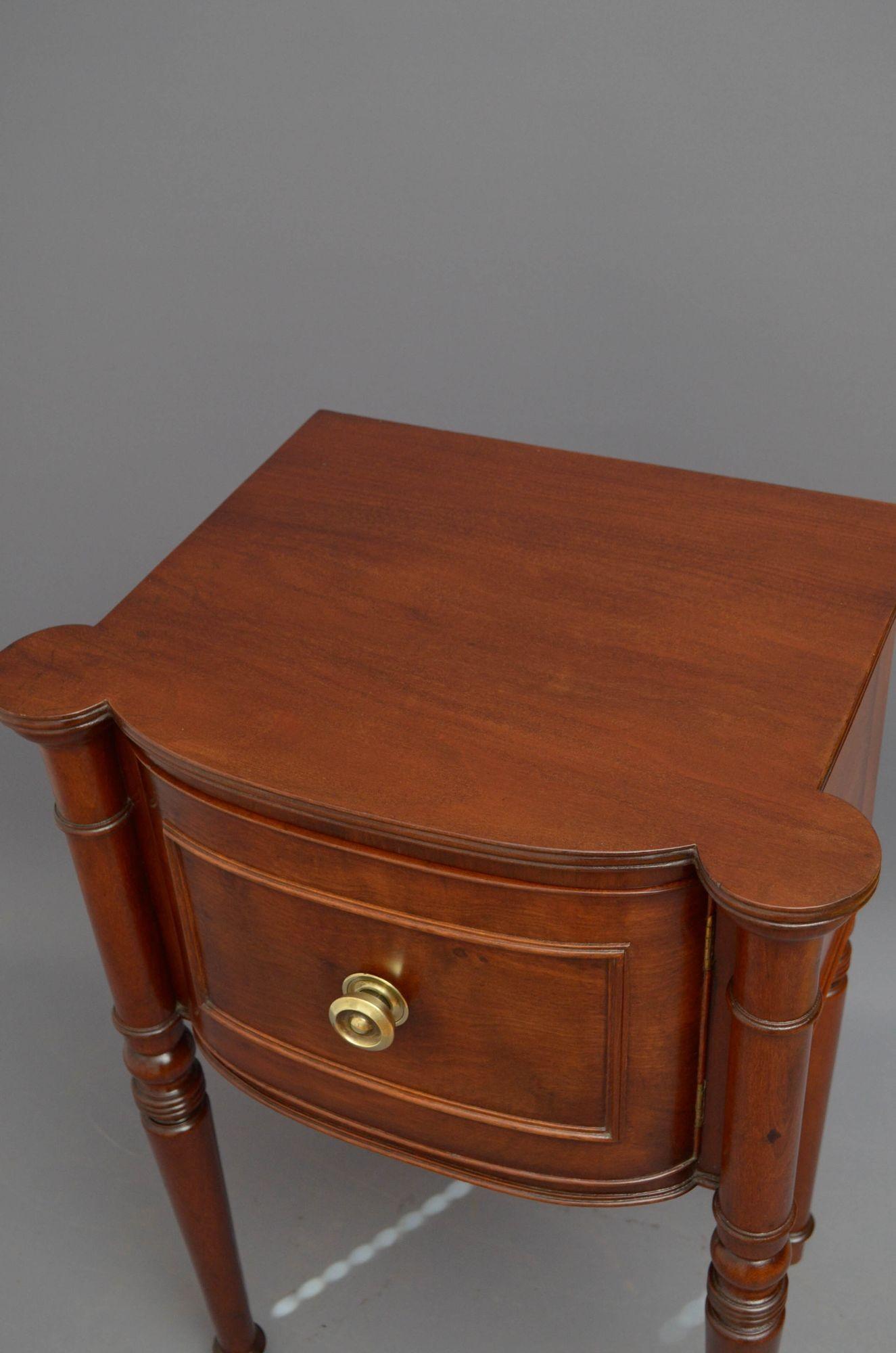 Sn5327 Very unusual Regency pot cupboard of bow fronted design, having figured top with reeded edge above moulded and panelled door fitted with original knob, all standing on turned and ringed legs. This antique bedside cabinet is in home ready