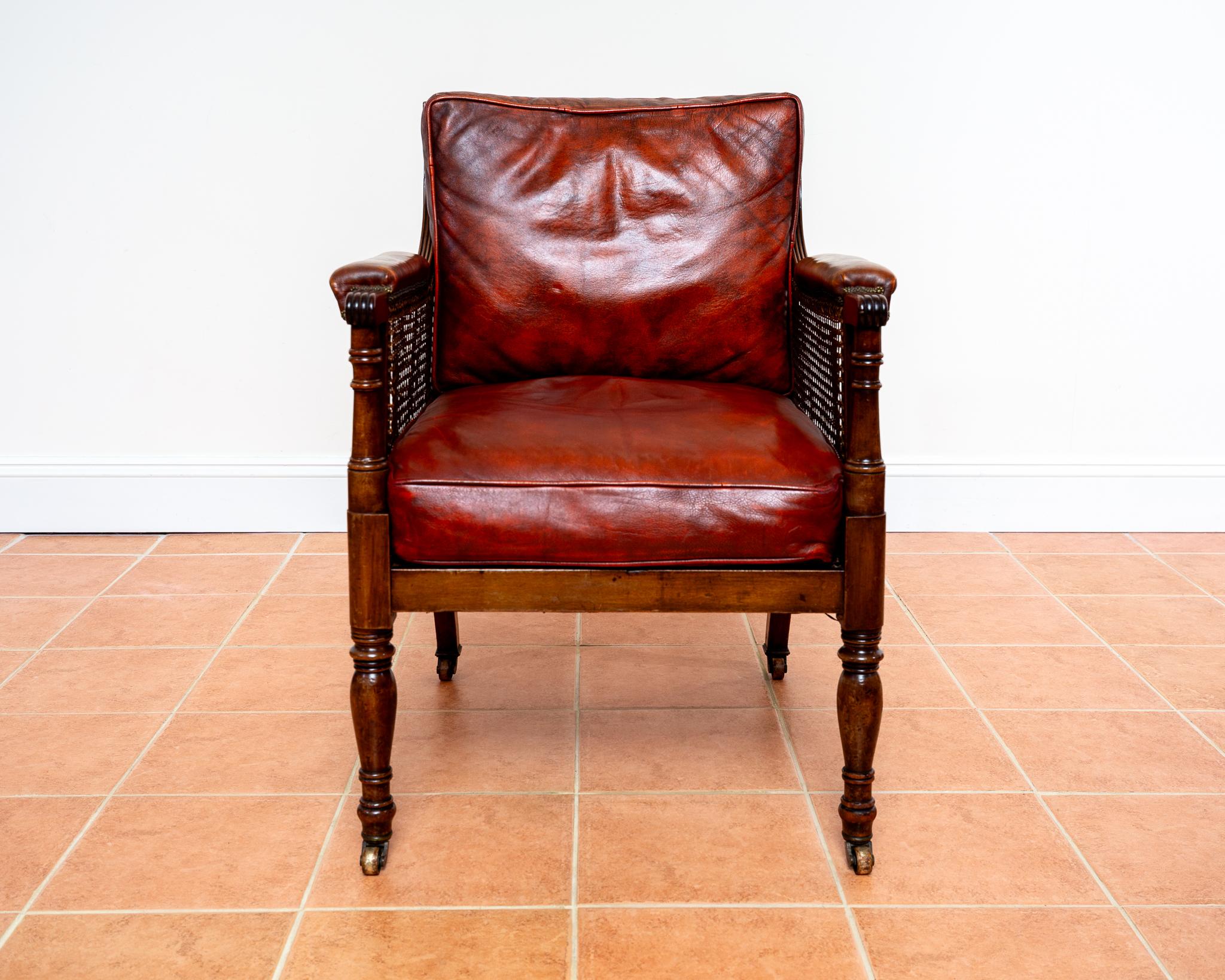 English Regency Mahogany Bergere Leather Library Chair 1810-1820 Georgian Red Armchair For Sale