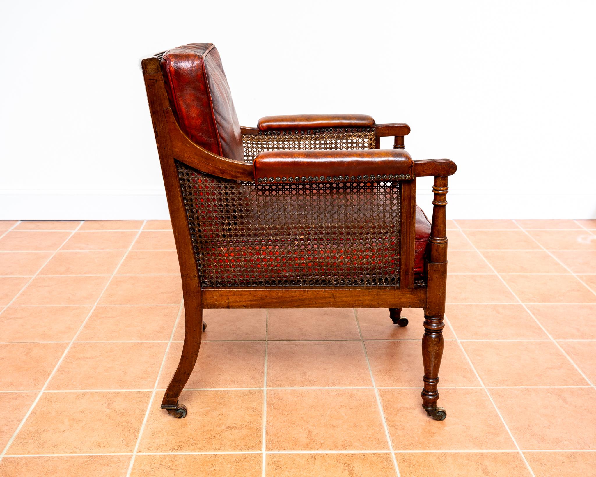 Brass Regency Mahogany Bergere Leather Library Chair 1810-1820 Georgian Red Armchair For Sale