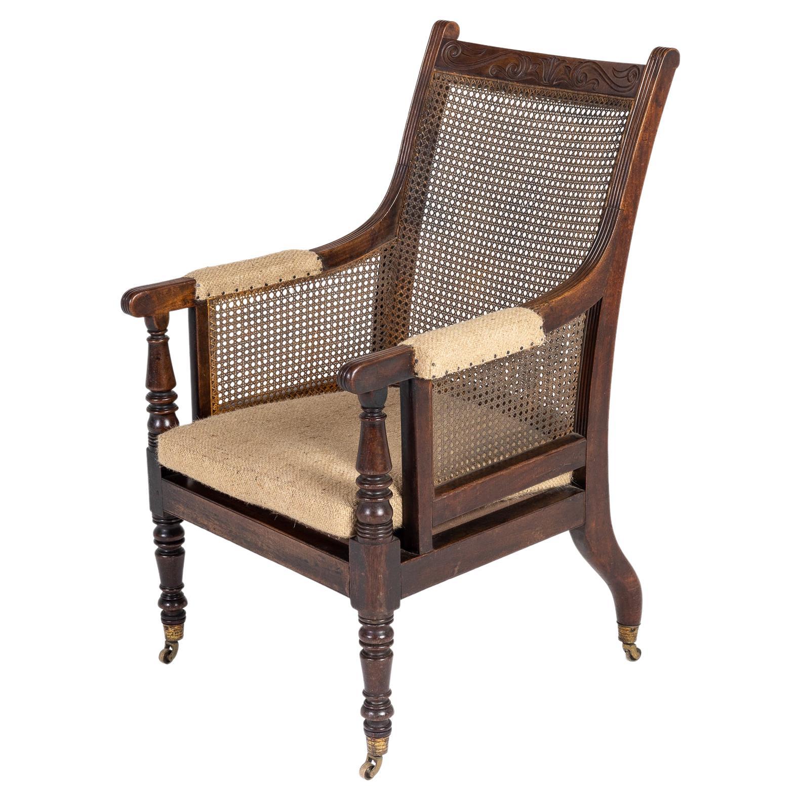 Regency Mahogany Bergère Library Armchair (in the manner of Gillows) For Sale