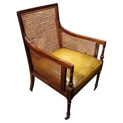 Regency mahogany bergere library chair 
