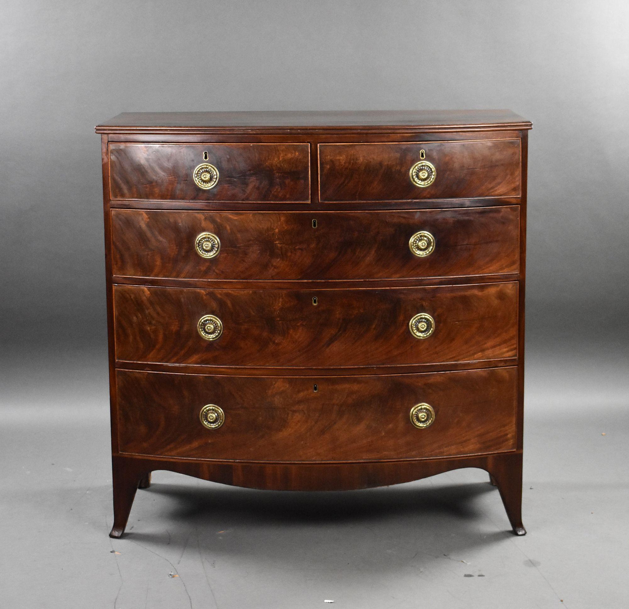 For sale is a fine quality Regency mahogany bow front chest, having an arrangement of two short over three long drawers, each with fell figured fronts and brass handles, the chest stands on elegant splayed feet and remains in very good condition for