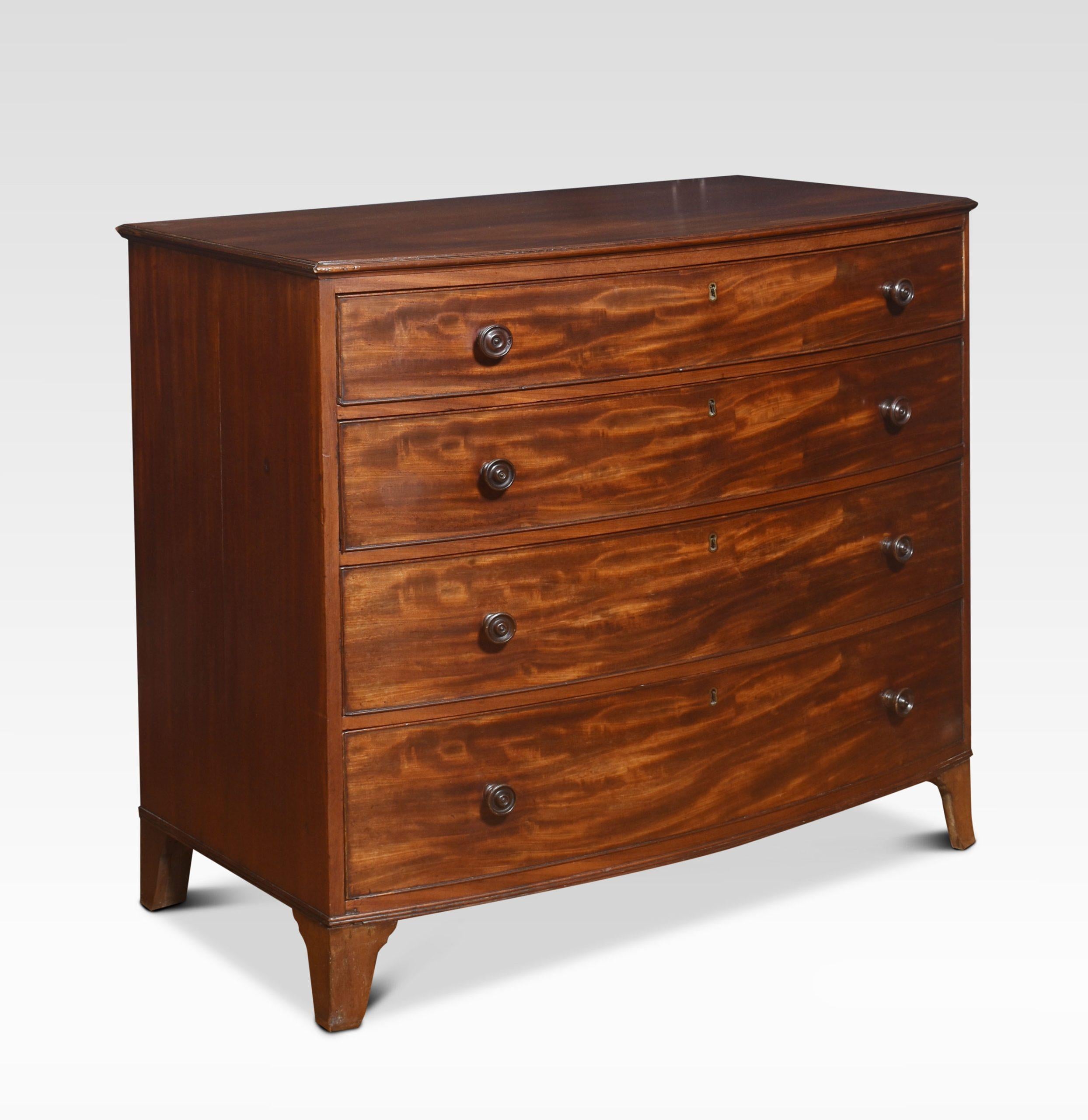 Regency mahogany bow fronted chest of drawers almost certanly Gillows. The shapedn well figured mahogany top with moulded edge, above four long graduated drawers with turned wooden handles and solid oak draw liners. All raised up on splayed