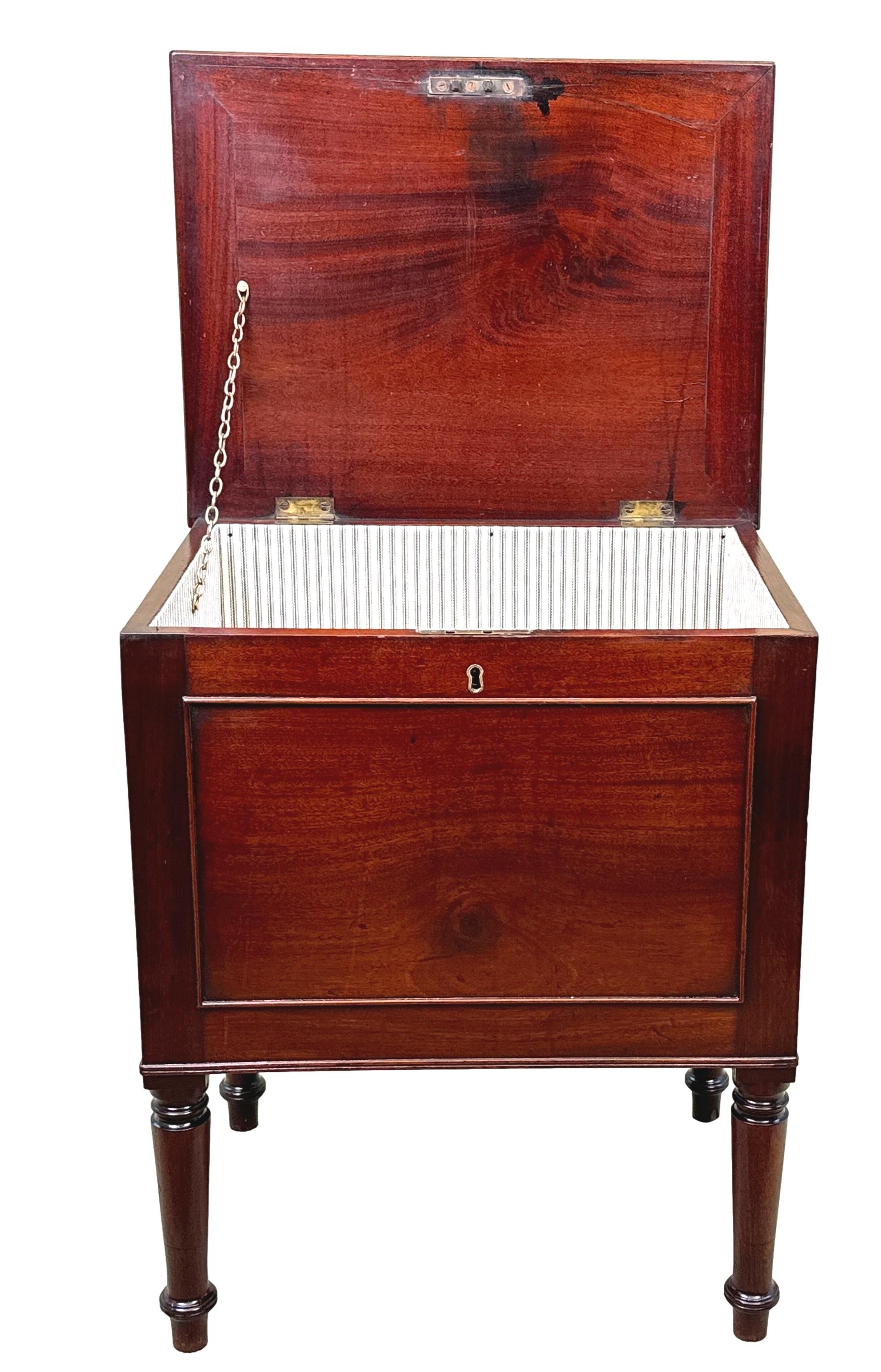A Very Fine Quality Regency Period, Georgian, Mahogany Box Cellarette, The Well Figured Lift Up Lid Enclosing Recently Fabric Lined Interior Storage Cavity, Having Moulded Panel Front And Sides Retaining Original Brass Handles, Raised On Extremely