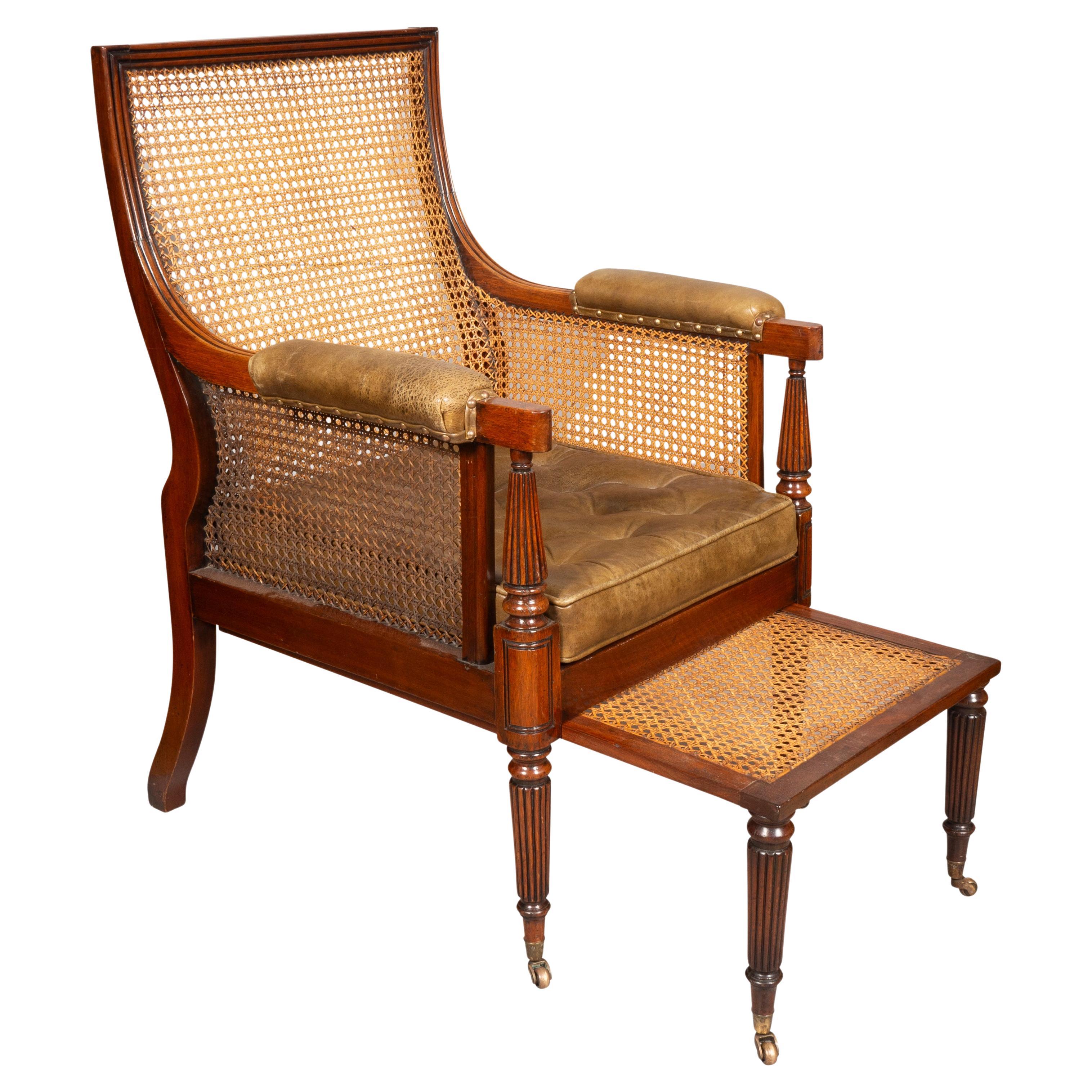 Regency Mahogany Caned Bergere And Ottoman For Sale