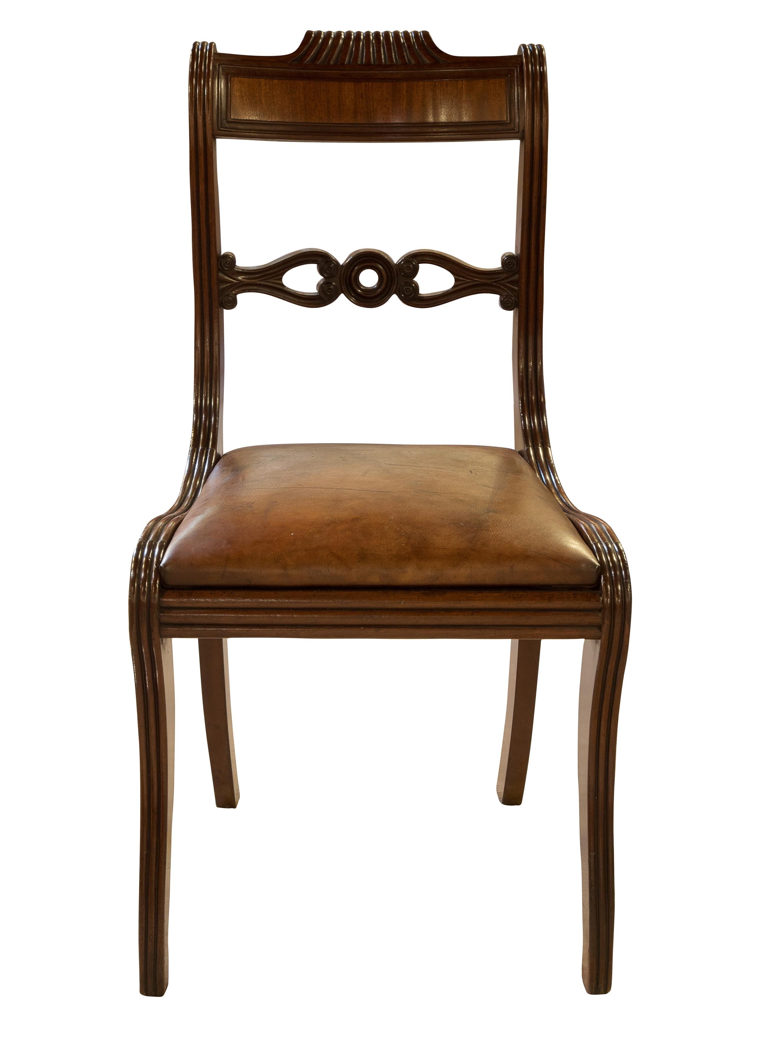 Regency mahogany chair with leather upholstered seat,


circa 1830.