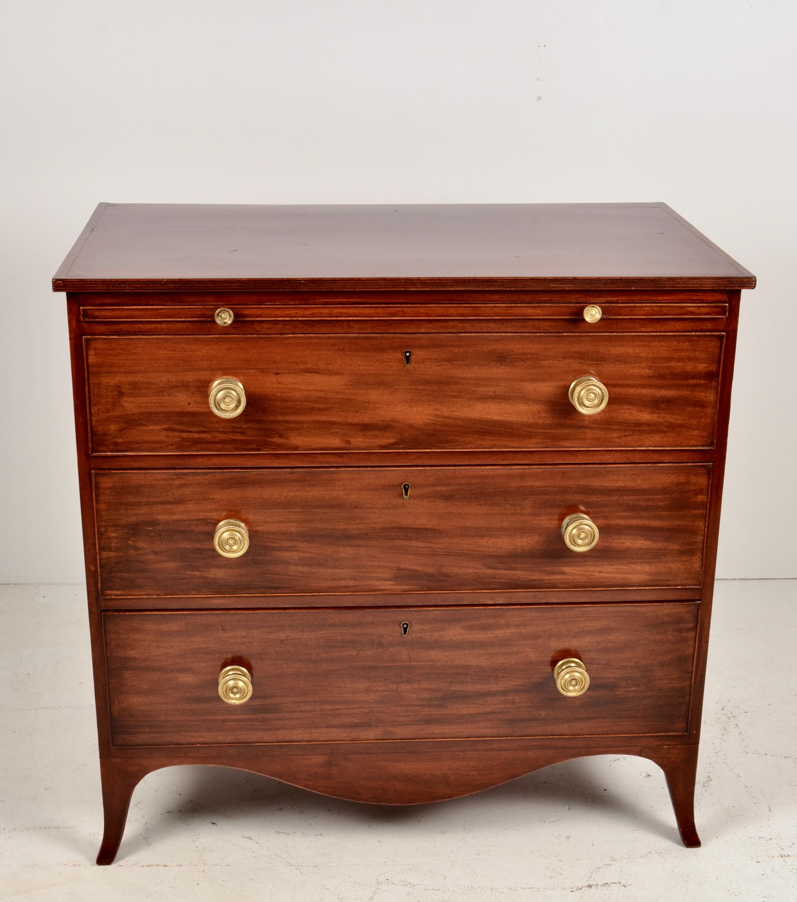 Regency Chest, beautifully French polished mahogany with original solid brass pulls. Flared French feet. Purchased in 2000 from HRW Antiques in London. Very fine condition, lovely rich finish.