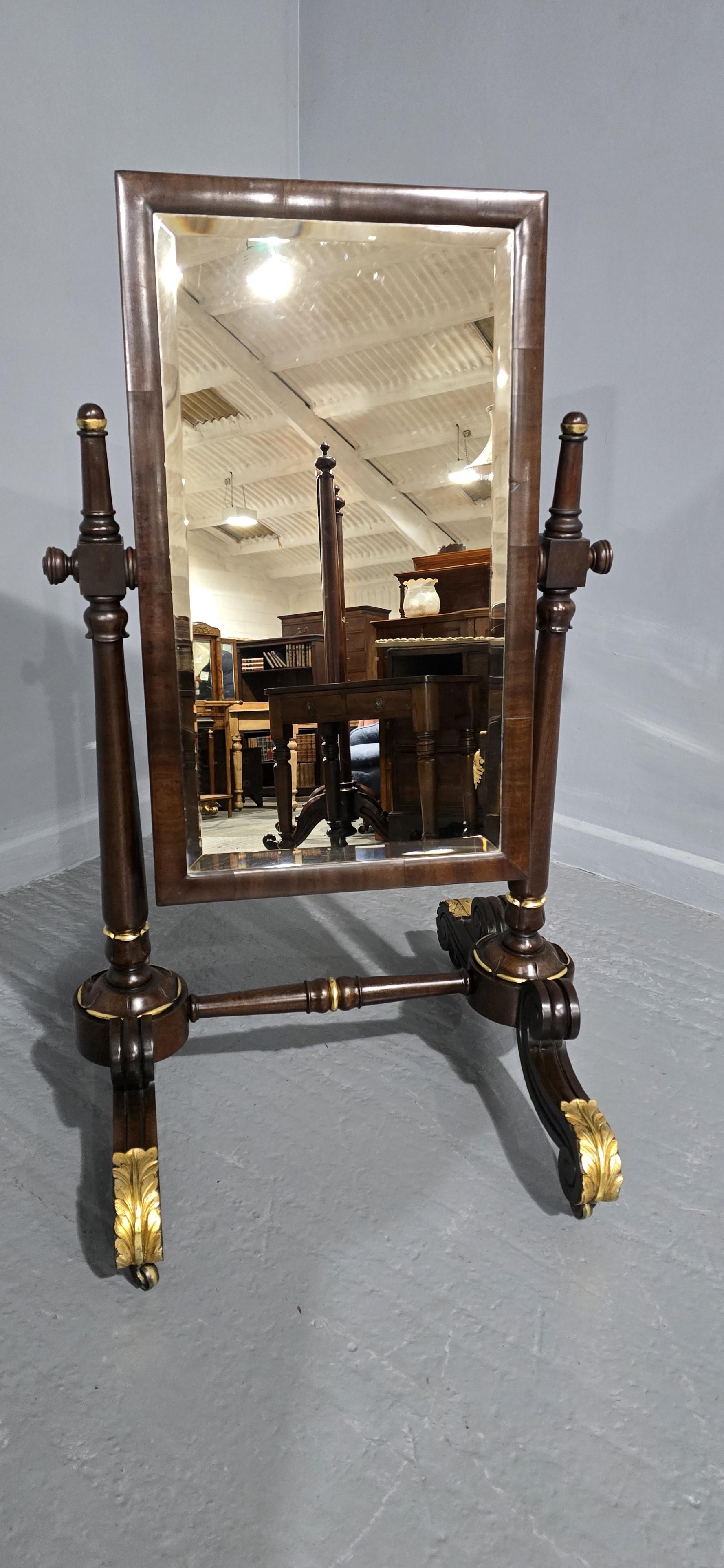 A very nice quality Regency mahogany and parcel gilded cheval mirror with bevelled glass, in excellent overall colour and condition.

44