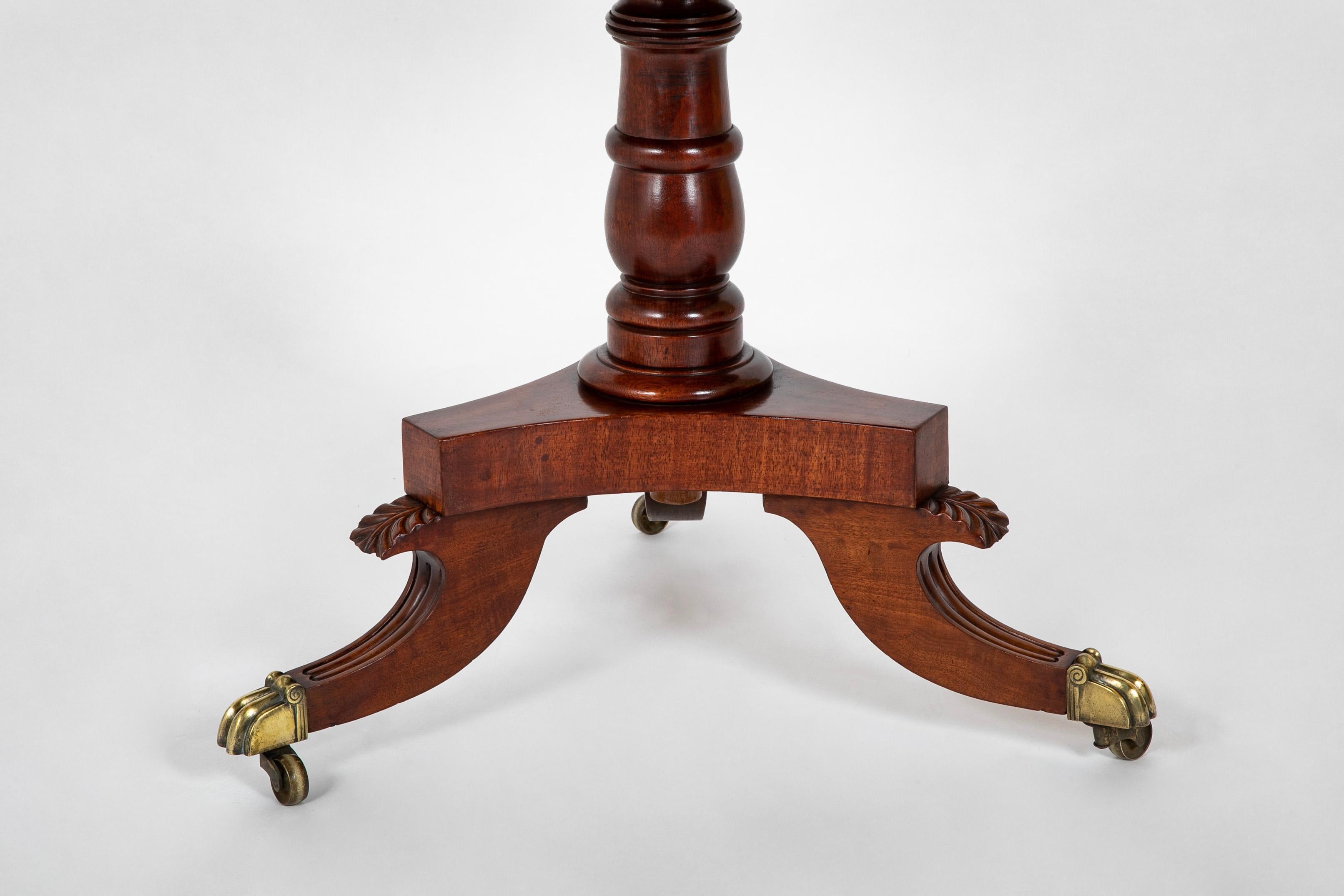 Hand-Carved Regency Mahogany Circular Three Tier Folding Dumbwaiter Etagere Brass Castors For Sale