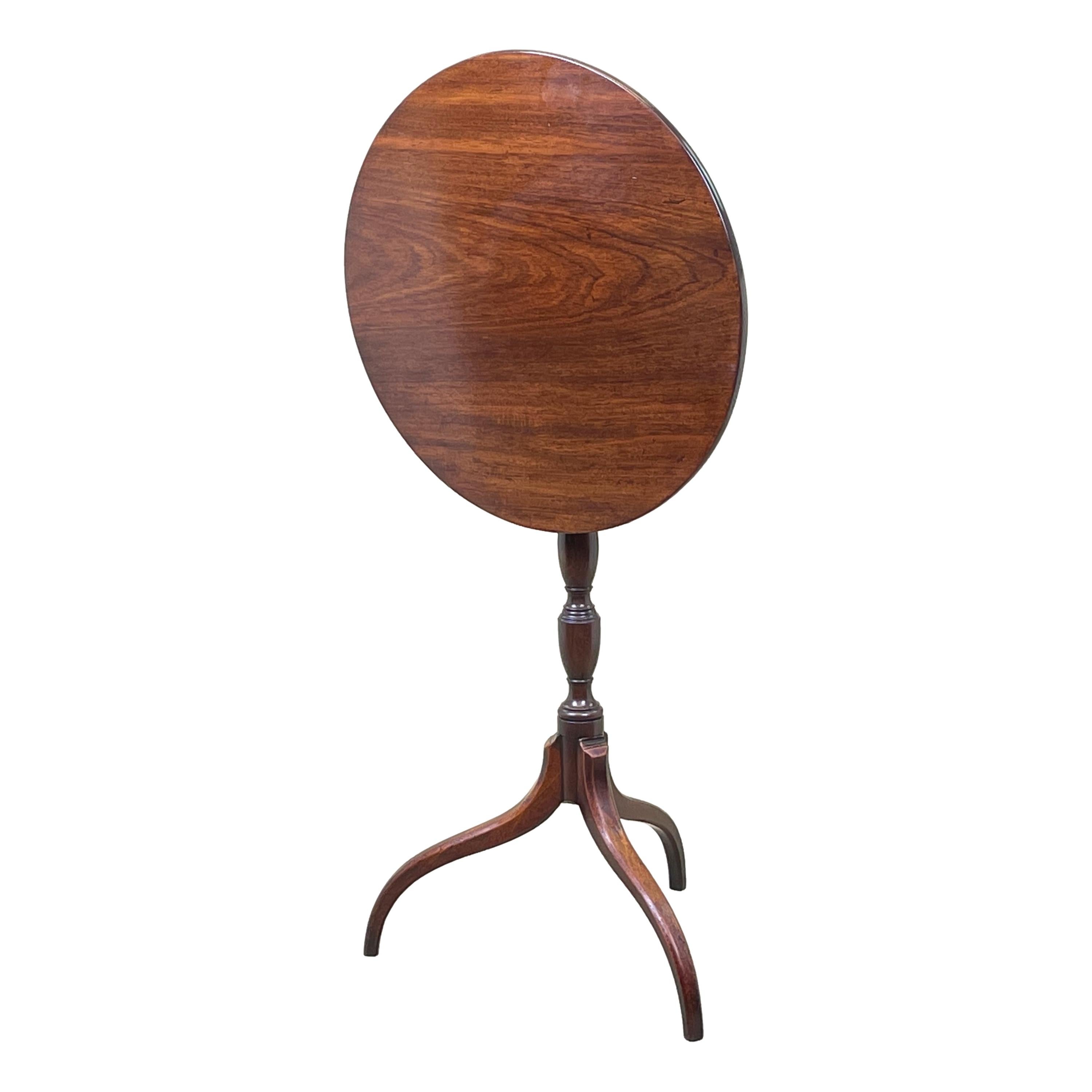 A Very Good Quality Regency Period, mahogany wine table, Or Occasional Lamp Table, Having Superbly Figured Circular Tilting Top Over Elegant Turned Central Column Terminating On Umbrella Tripod Legs.


This simple, but beuatiful little lamp table