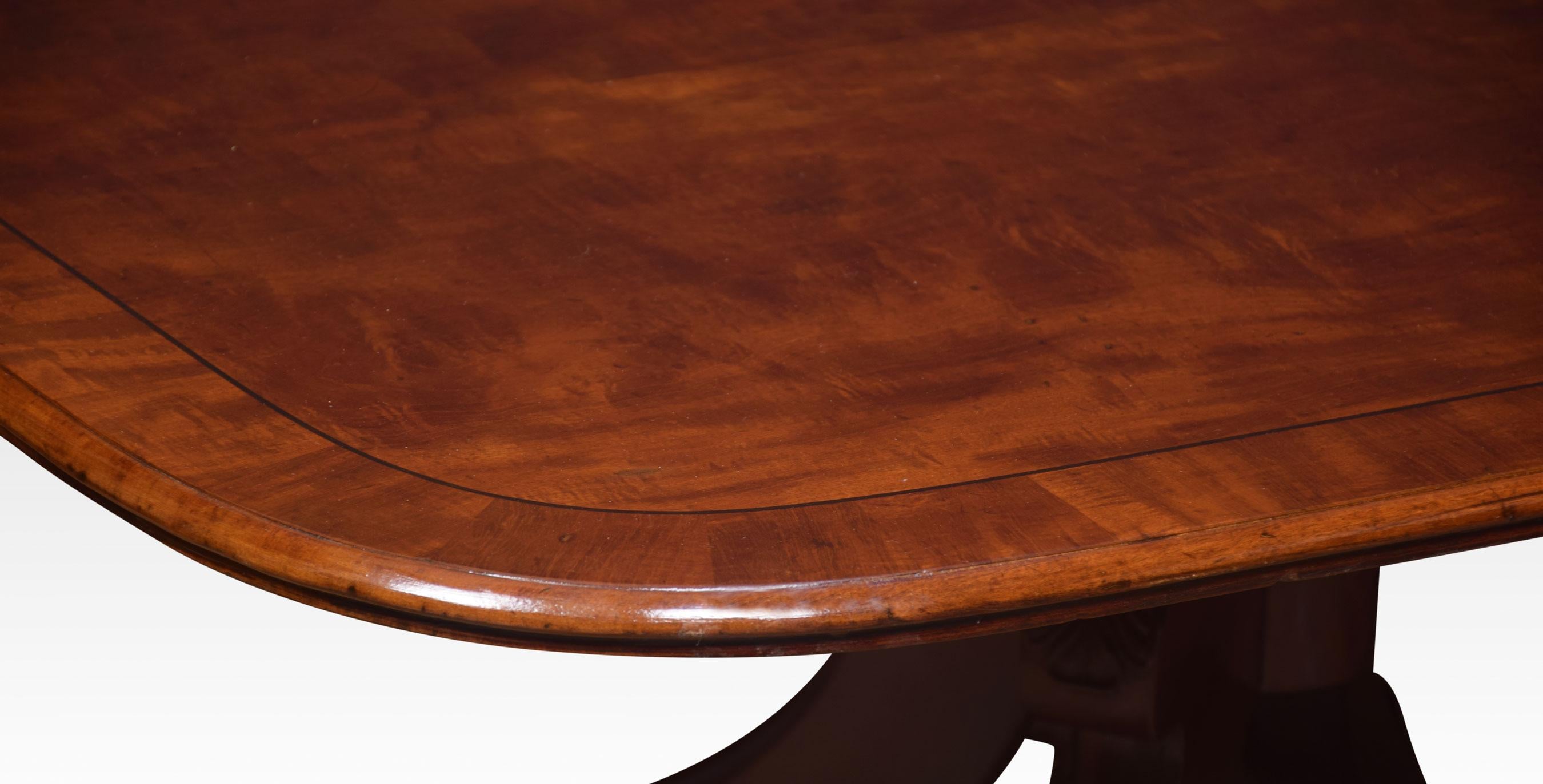 19th Century mahogany coffee table, the rectangular top and crossbanded edge enclosed by ebony stringing. Raised on a pedestal base and four outswept legs. This table has been reduced to coffee table height
Dimensions
Height 19.5 Inches
Width 54