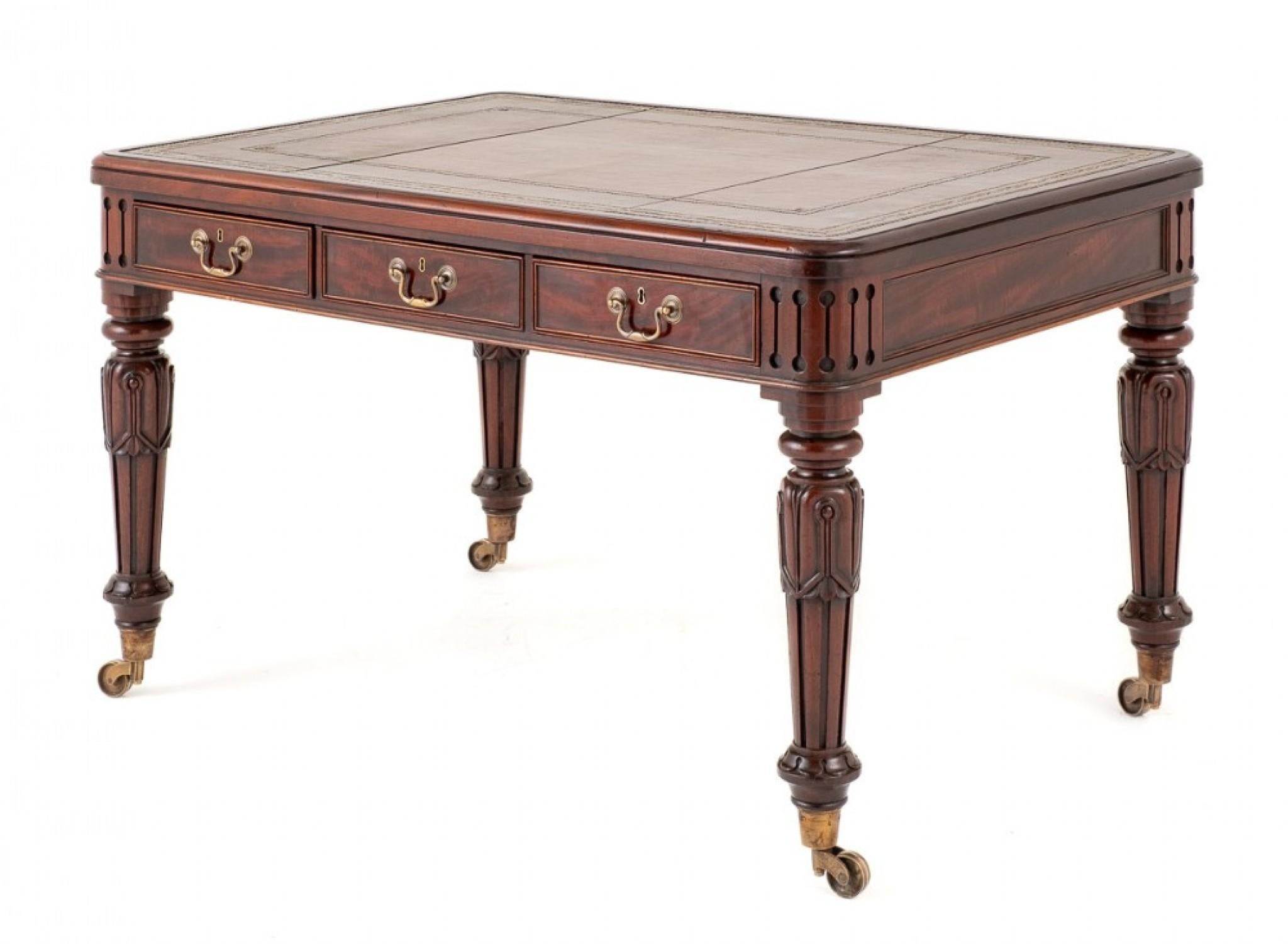 Impressive Regency Mahogany Library Table.
Period Regency
This Table is Raised upon Impressive Ring Turned, Fluted and Carved Legs with Brass Castors.
Featuring 6 x Mahogany Lined Working Drawers which have Brass Swan Neck Handles.
The Top of the