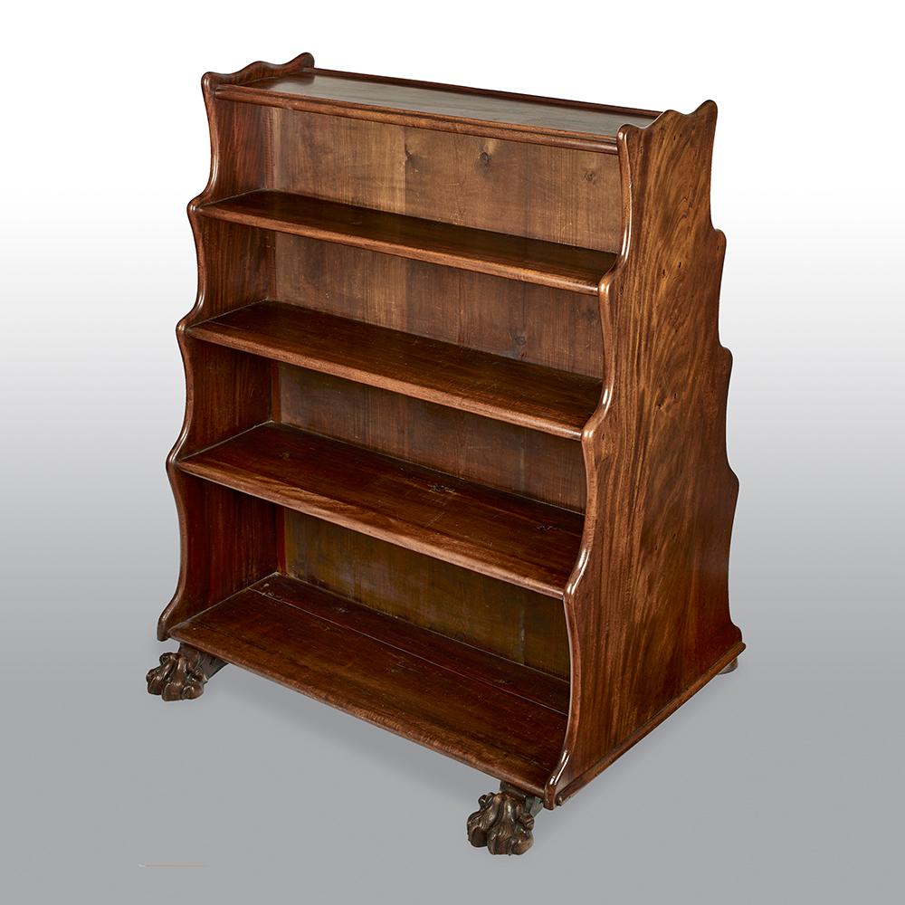 A rare Regency mahogany double sided waterfall bookcase raised on hairy paw feet, and having matched frame ends. This is extremely rare to find a double sided bookcase, which allows the piece to be centralised in any room.

Provenance: Altringham