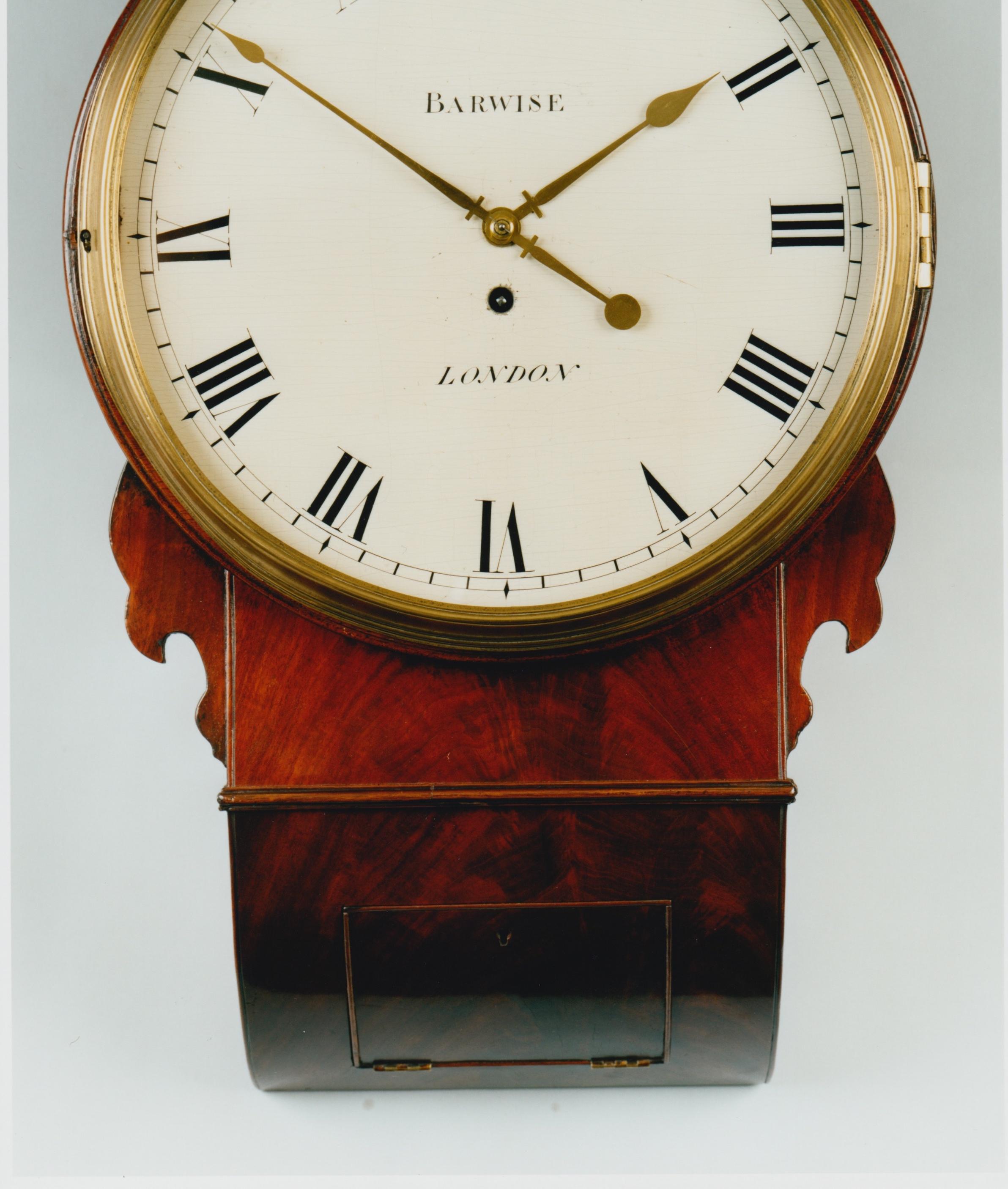 A fine quality early 19th century mahogany wall drop dial timepiece by this prestigious family of clockmakers. The fully signed white painted wooden 12 inch dial retains its original crackelure surface and gilt brass hands, the minute hand with