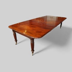 Regency mahogany extending dining table