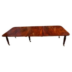 Regency mahogany extending dining table