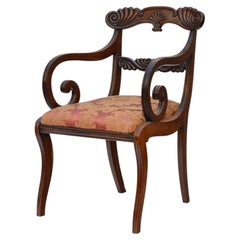 Regency mahogany sabre leg armchair