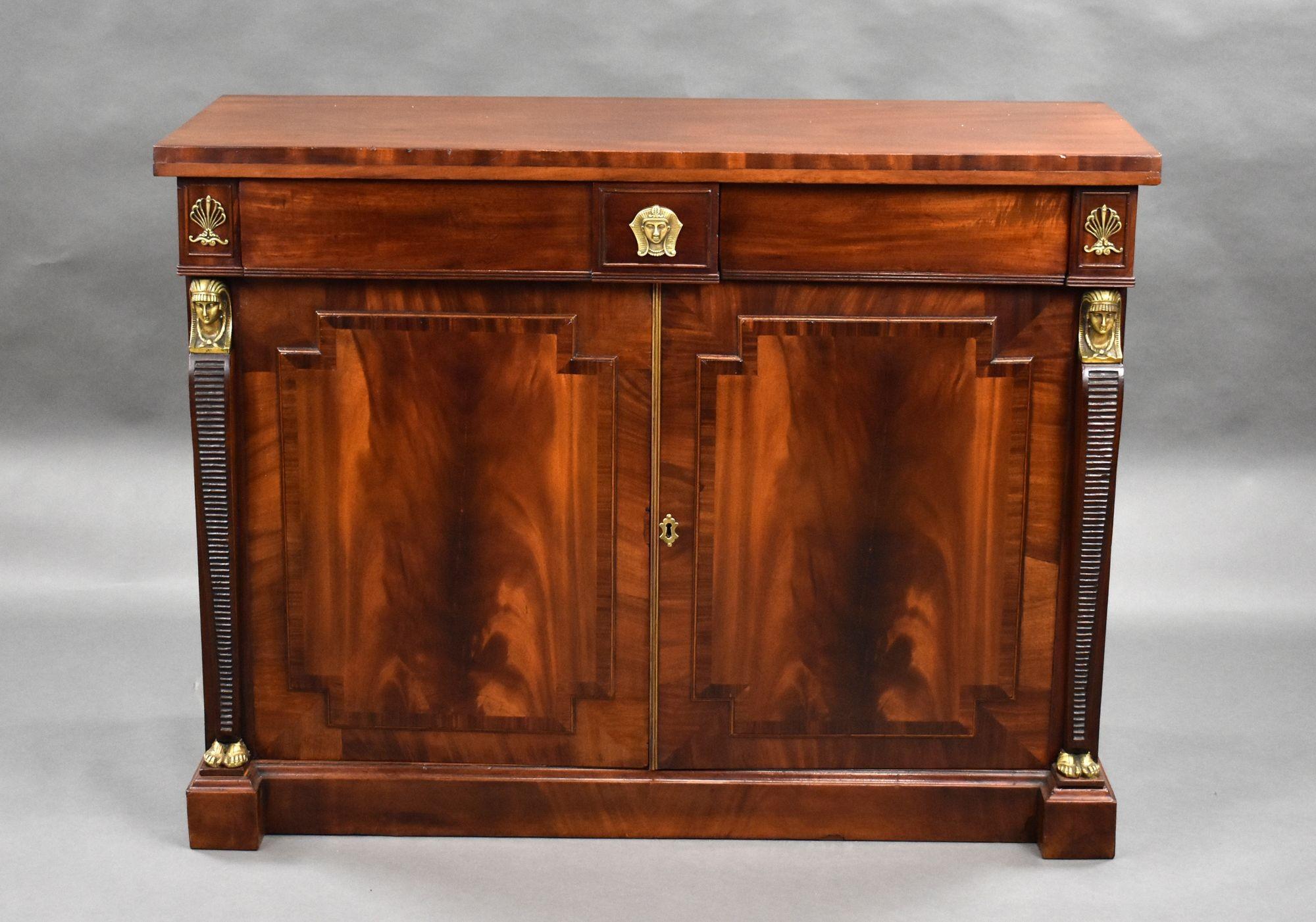 For sale is a good quality Regency mahogany sideboard, decorated with Egyptian style motifs throughout, the doors open to reveal an interior fitted with shelves and drawers. This piece is in very good condition.

Width: 121cm Depth: 44cm Height: 93cm
