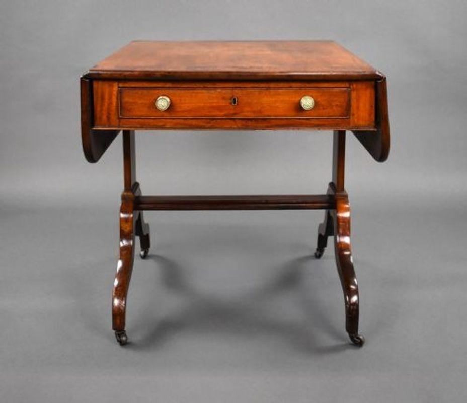 For sale is a Regency mahogany sofa table, having a rosewood cross banded top, above a single drawer with faux drawer on the opposing side. The table is in very good condition, showing minor signs of wear commensurate with age and use.

Width: 69cm