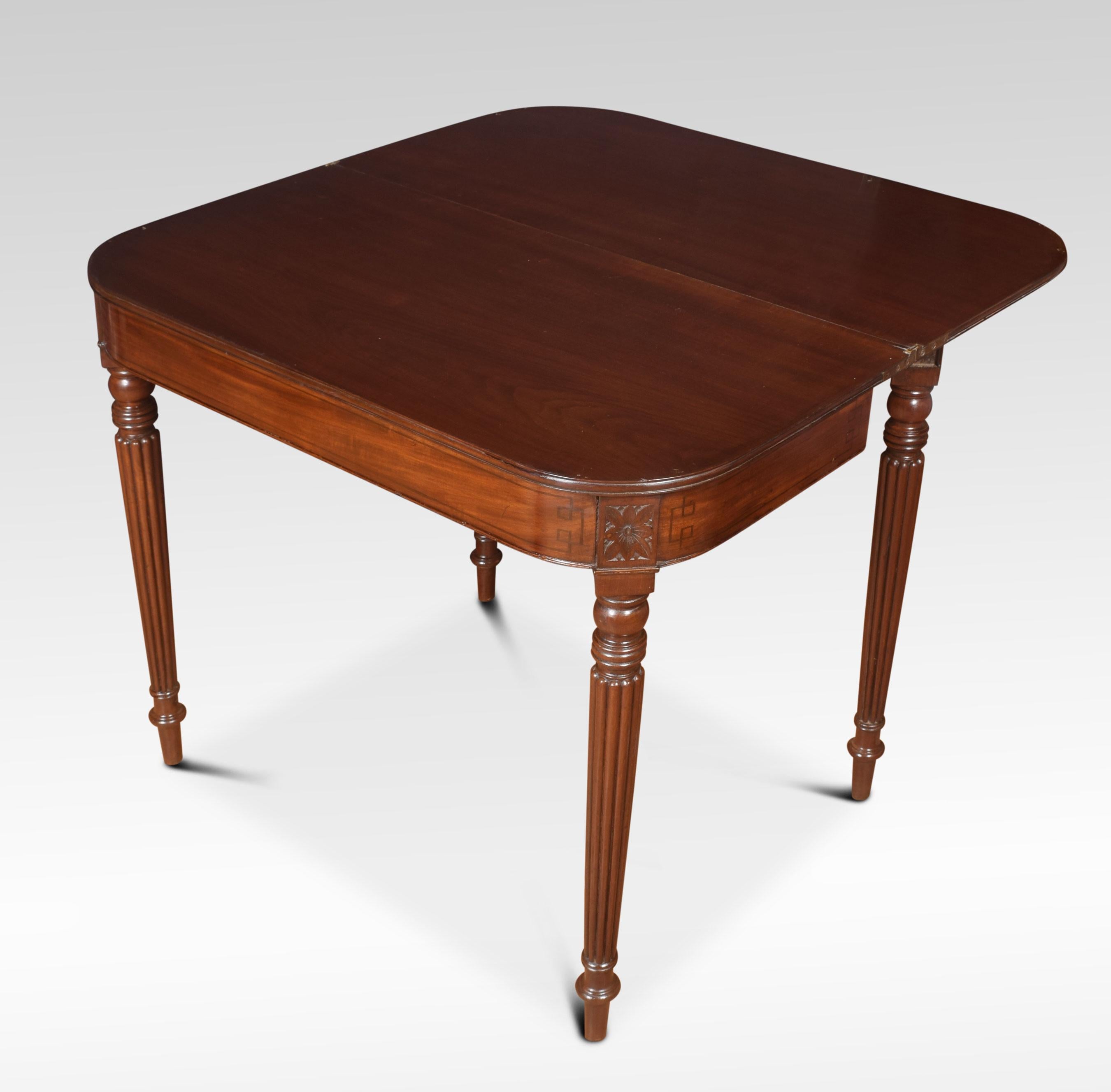 Regency mahogany tea table, the folding and swivel top, above ebony line inlaid frieze. Raised up on four reeded-turned tapering legs.
Dimensions:
Height 30 inches
Width 36 inches
Depth 17.5 inches.