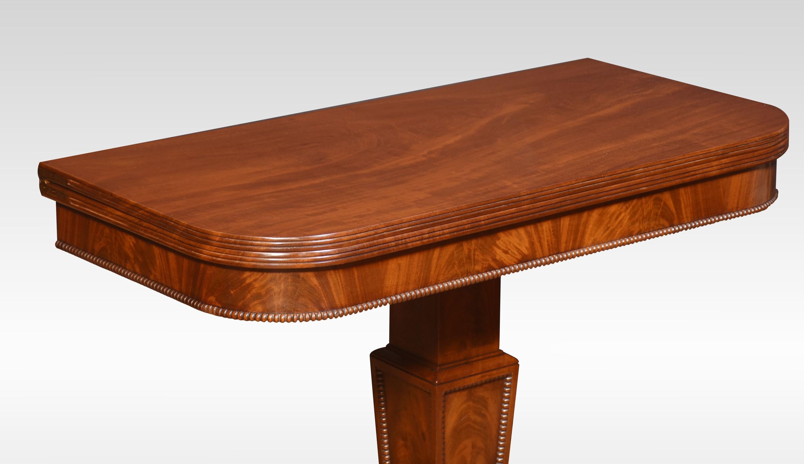 Mahogany tea table, the rectangular hinged top with rounded corners on square column and stepped splayed quadriform base. Terminating in brass caps and castors
Dimensions
Height 30 Inches
Width 36 Inches
Depth 18 Inches