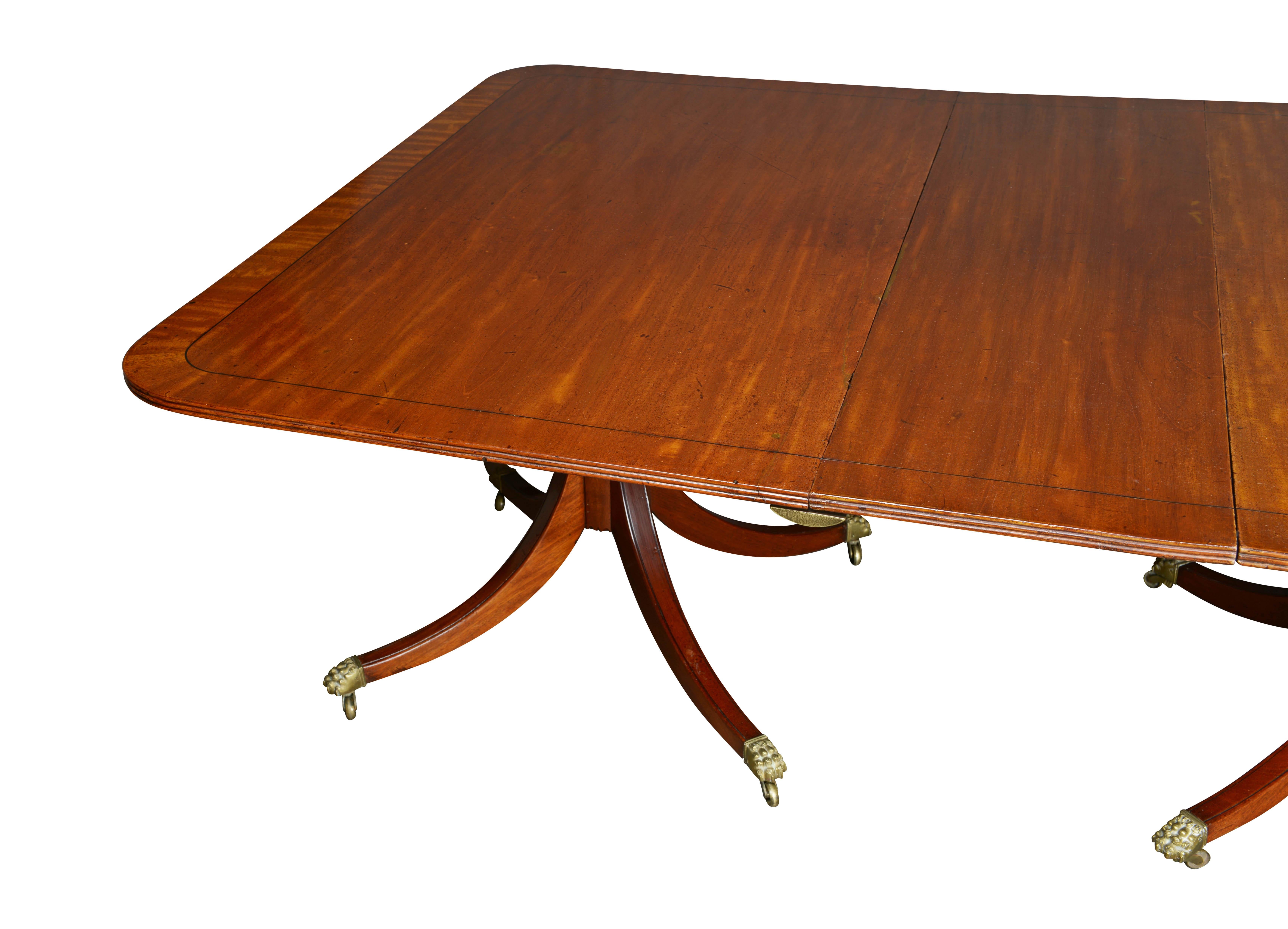 British Regency Mahogany Three-Pedestal Dining Table For Sale