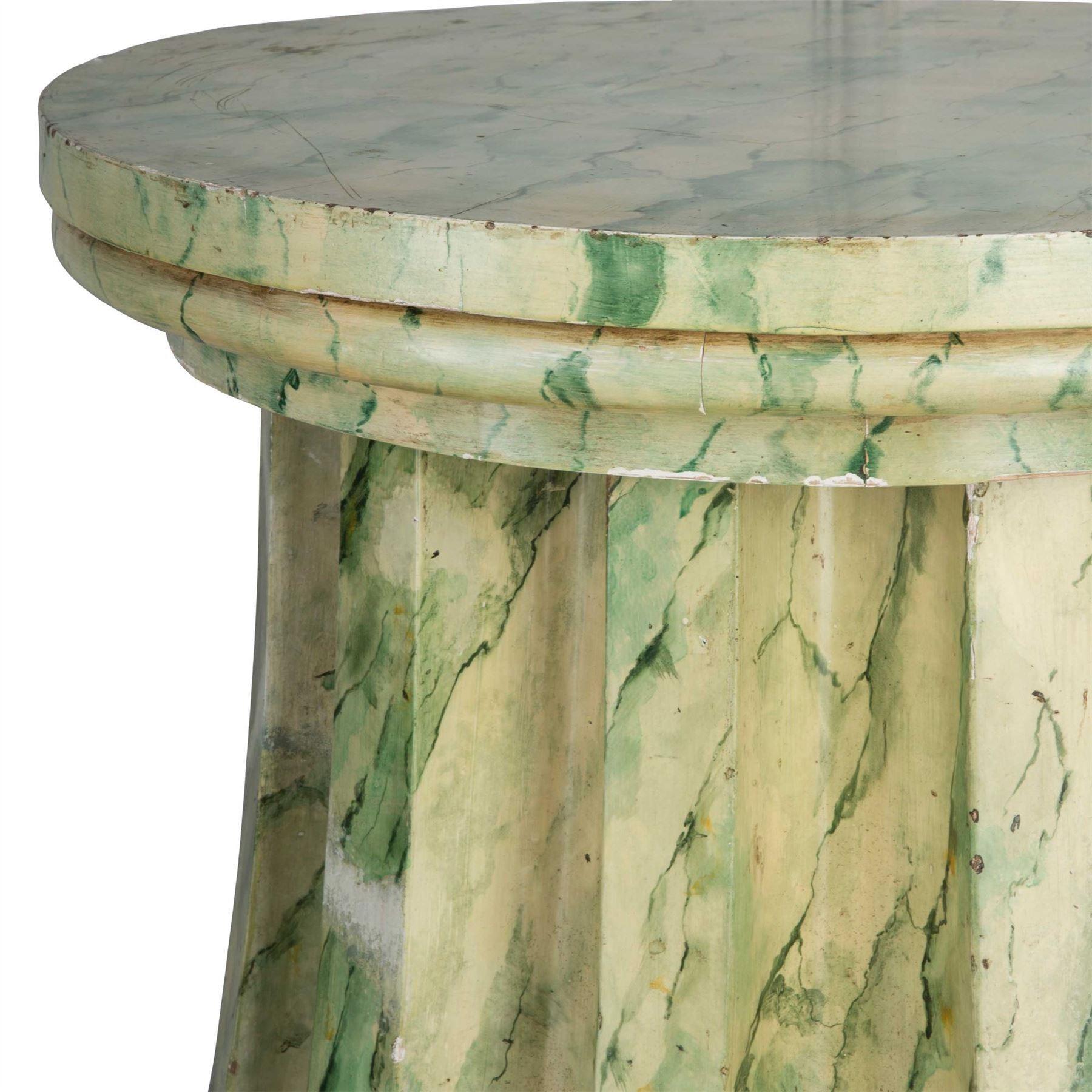 C19th simulated marble pedestal of massive proportions, the circular moulded top above an exagerated fluted trumpet shaped body, raised on a stepped plinth. English. 1830.

37.5