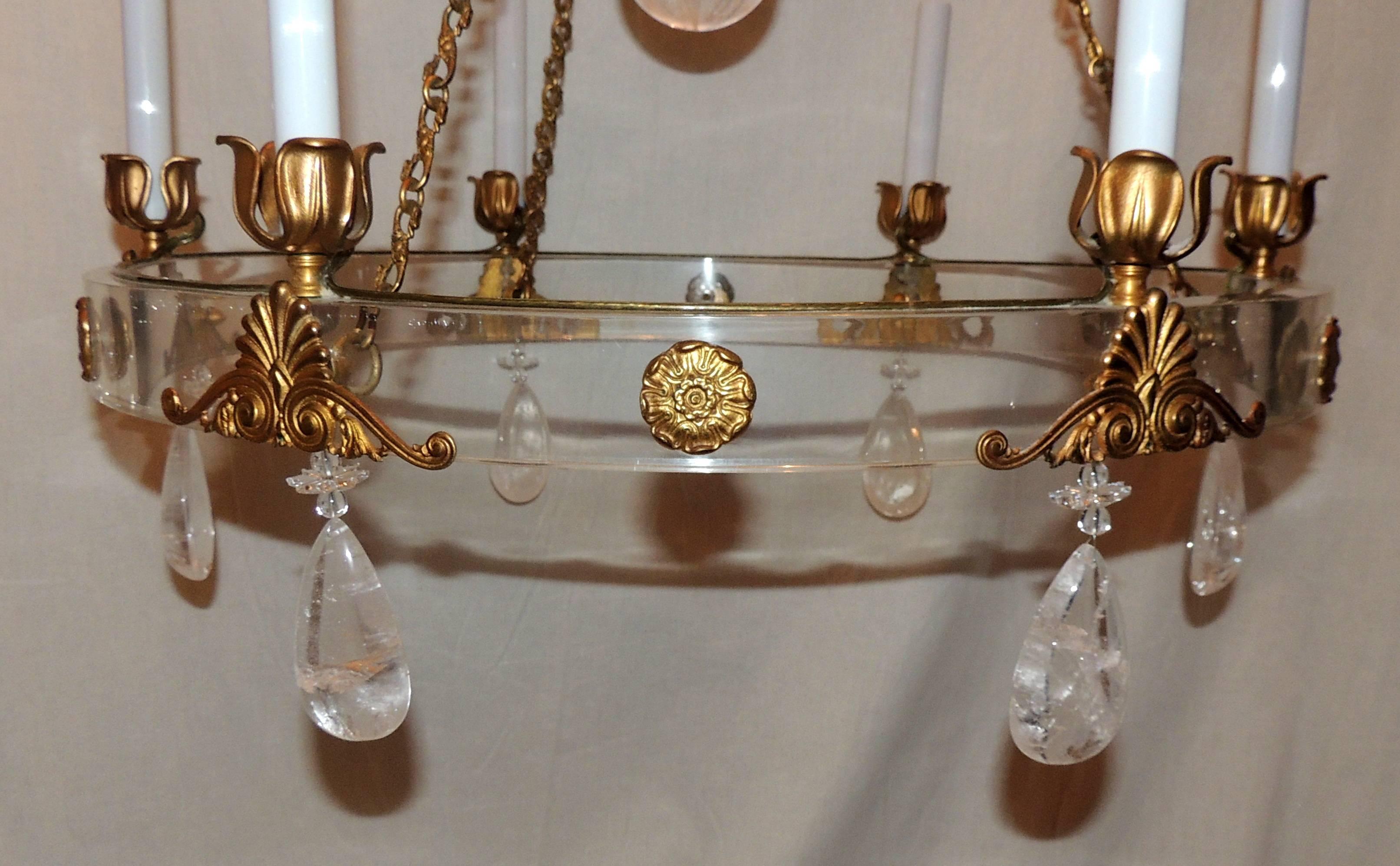 A wonderful Regency Empire Mid-Century Modern rock crystal and Lucite ormolu bronze French round six-light chandelier.