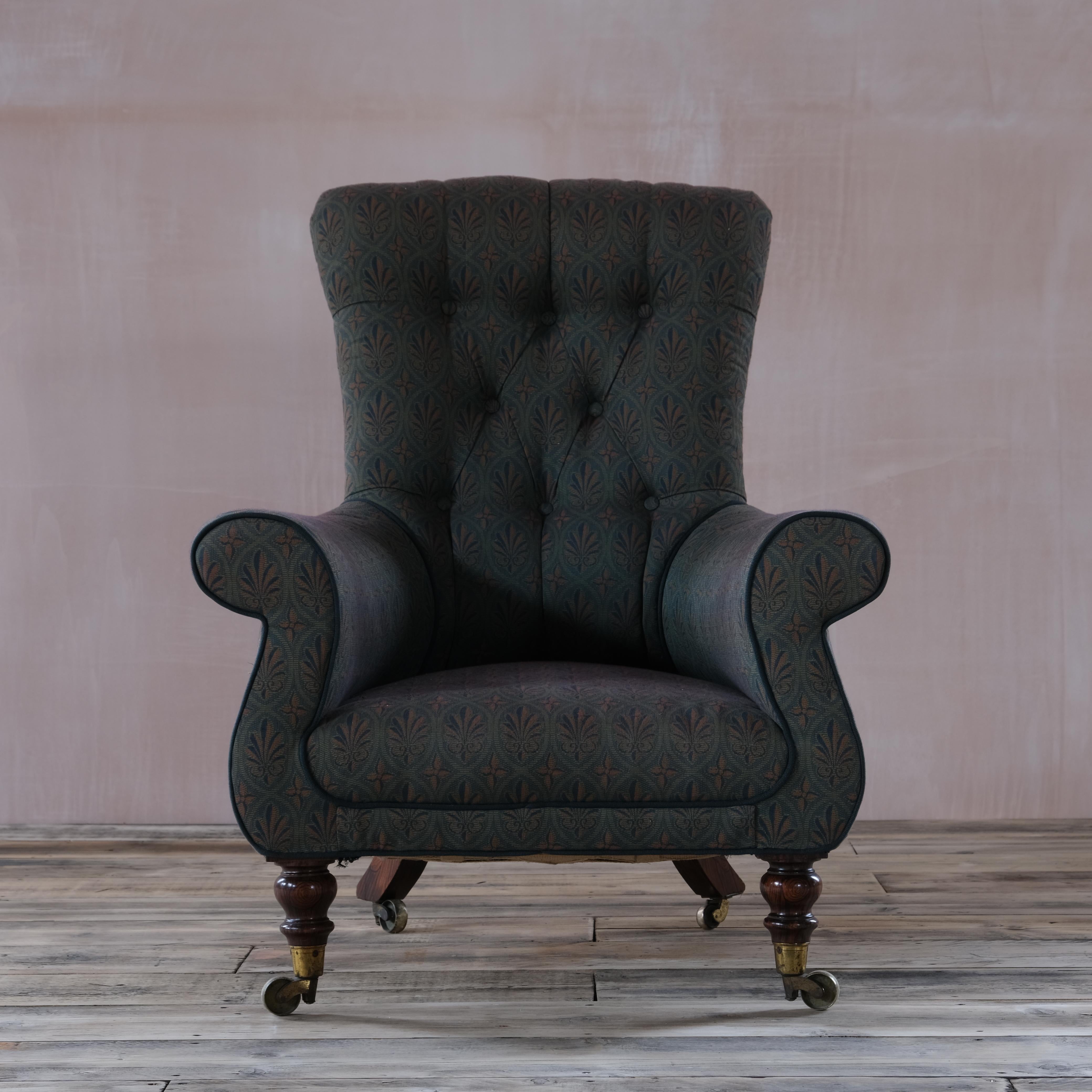 A very good quality regency armchair by Miles & Edwards - London. Raised on Faux rosewood legs and the original brass casters. circa 1835

Miles & Edwards were taken over by C Hindley & Sons in 1844

The fabric is in presentable order, clean