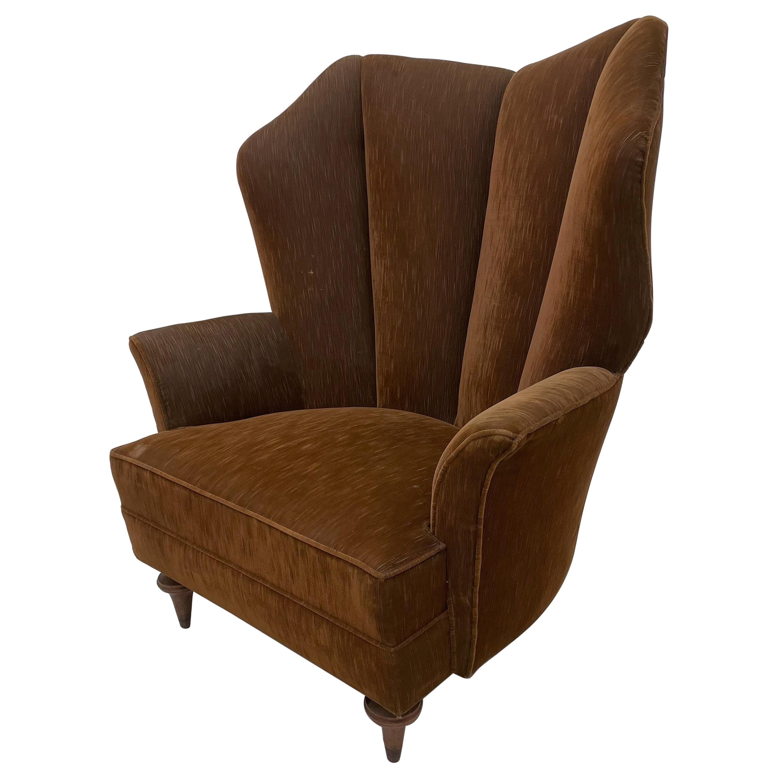 1940s Mexican Regency modernism high wingback lounge armchair by Arturo Pani
Retains original brown mohair.
No design label present. Attribution Arturo Pani Mexico City
Features sculptural walnut wood legs
40.5 H x 34.5 W x 30 D, arm 21.5 H, seat