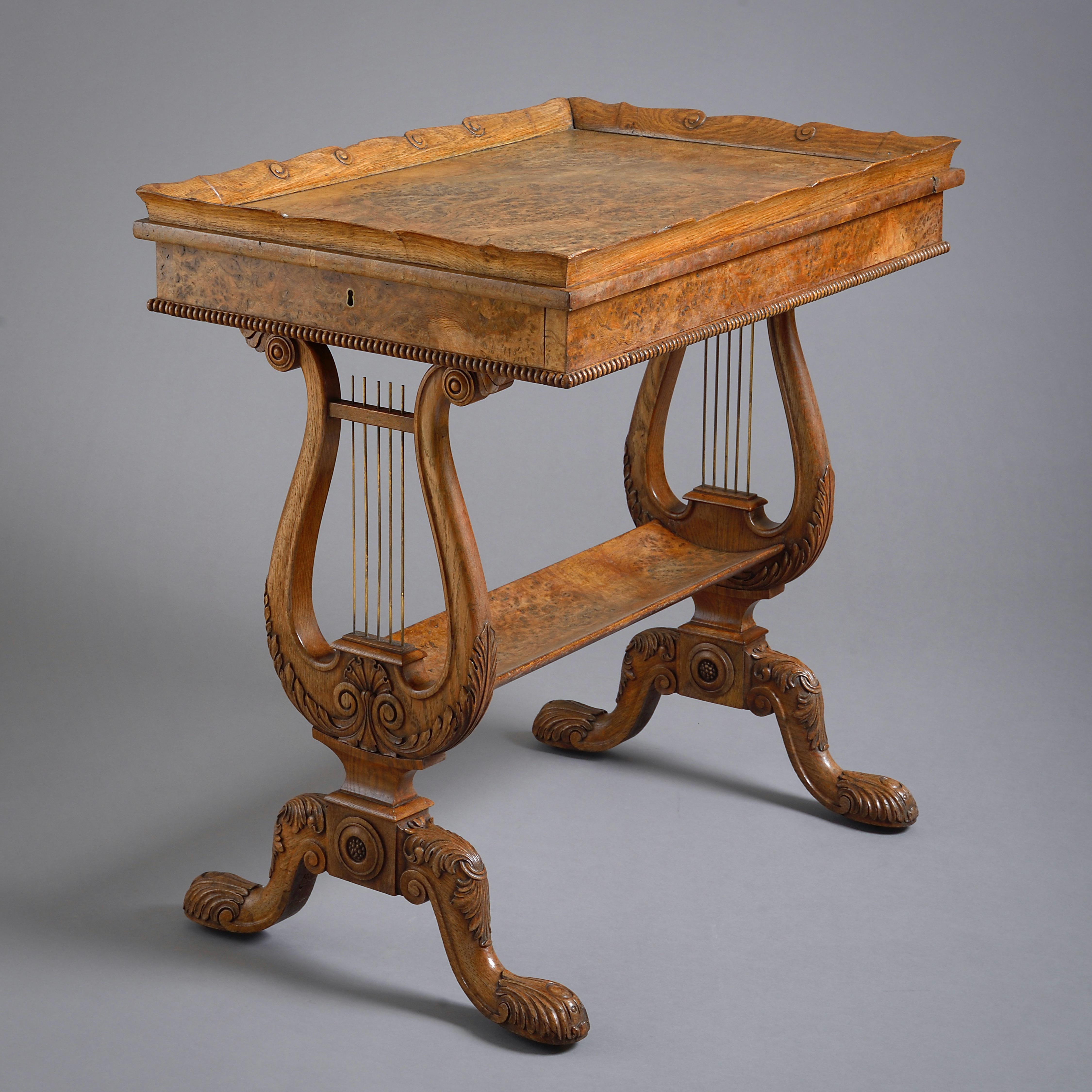 A fine Regency oak and burr-oak tray-top table by Gillows, circa 1820.

The frieze with a mahogany and cedar-lined drawer to each end, on lyre supports. The feet with concealed castors.