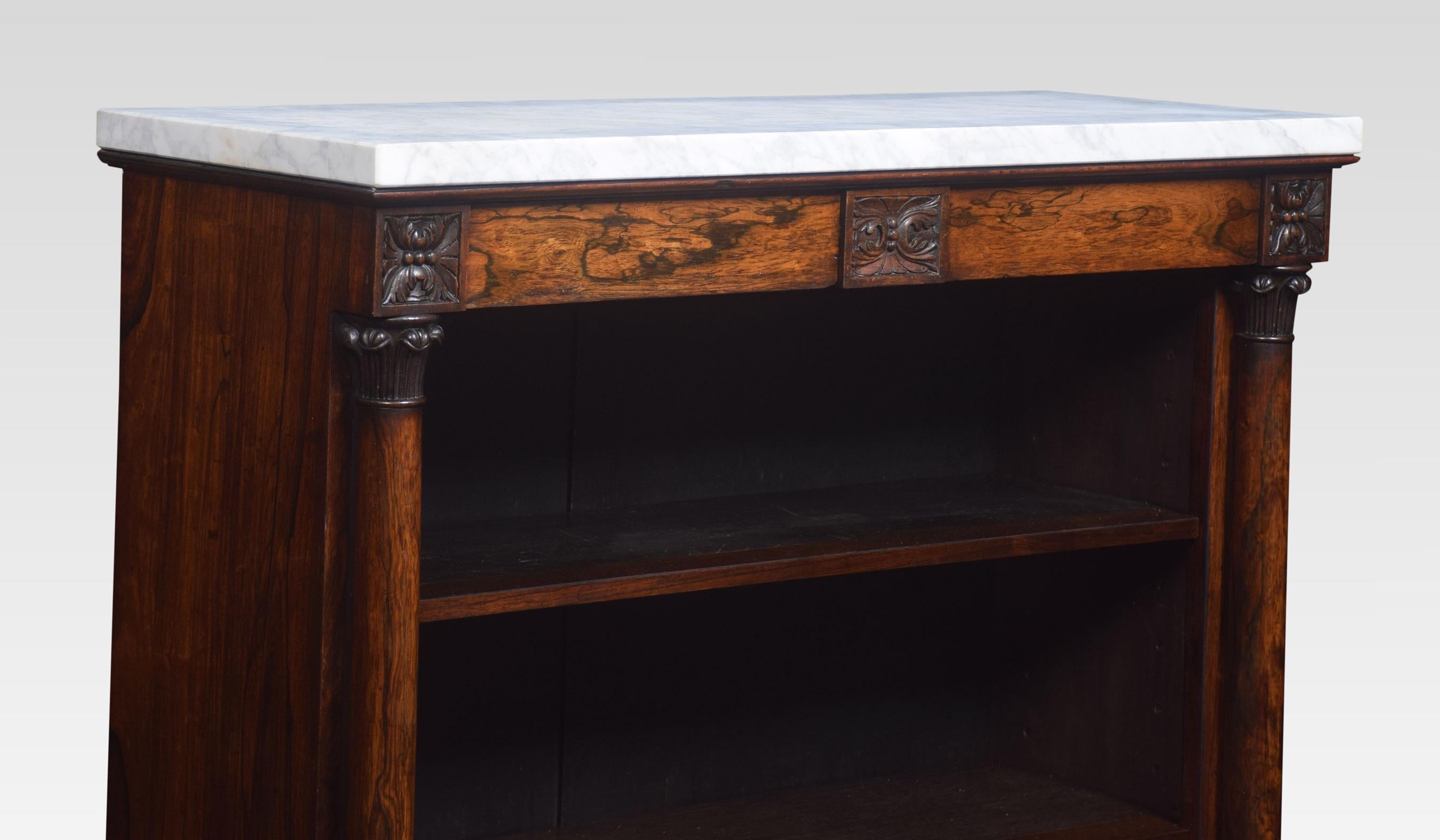 19th-century open bookcase, the rectangular marble top above carved frieze supported on circular columns. Enclosing two adjustable shelves, all raised up on plinth base.
Dimensions
Height 36.5 inches
Width 38 inches
Depth 14.5 inches.