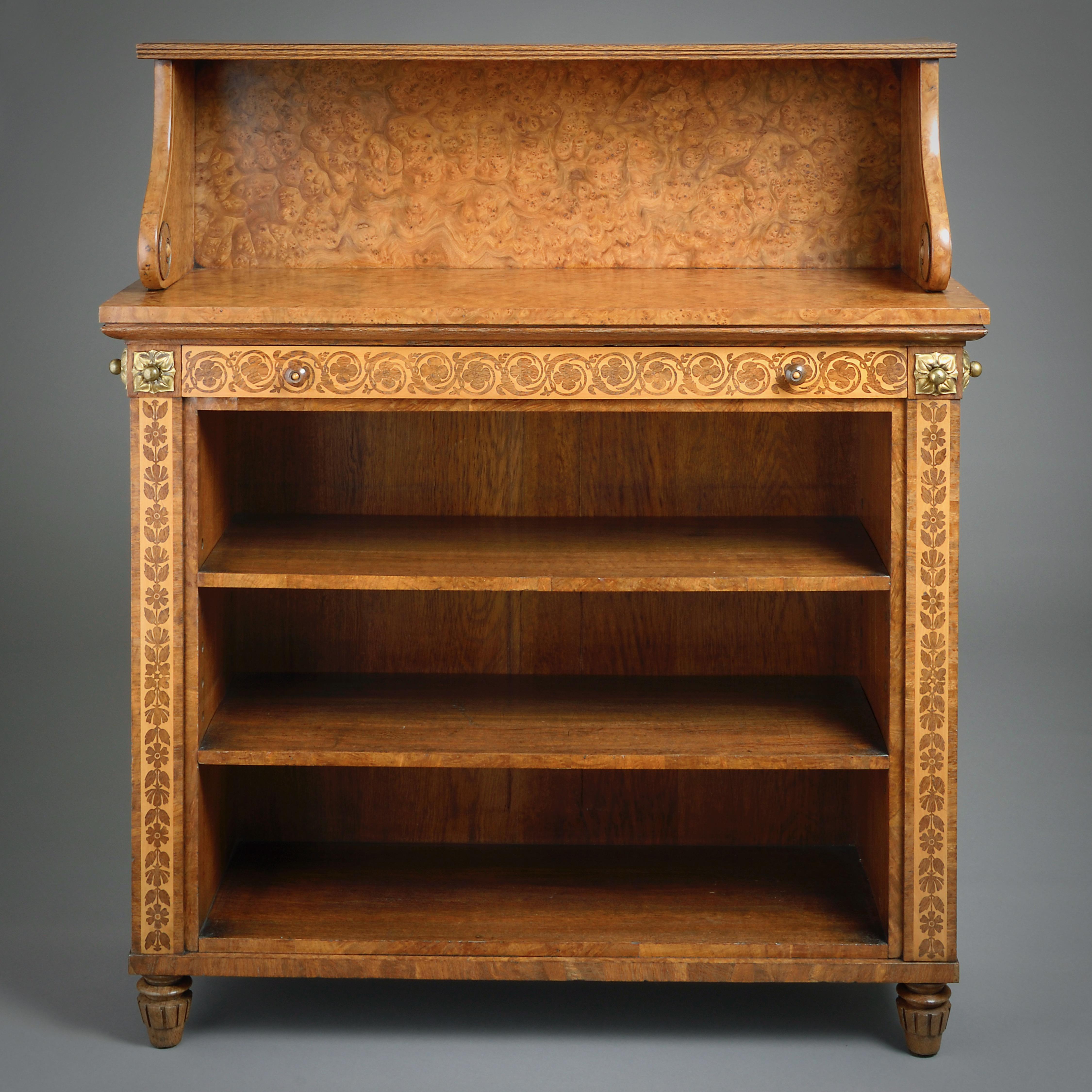 A FINE REGENCY ORMOLU-MOUNTED POLLARD OAK AND HOLLY LOW BOOKCASE ATTRIBUTED TO GEORGE BULLOCK, CIRCA 1815.

Fitted with a mahogany-lined frieze drawer above adjustable shelves.

Closely related to the furniture supplied by Bullock in 1817 to Matthew