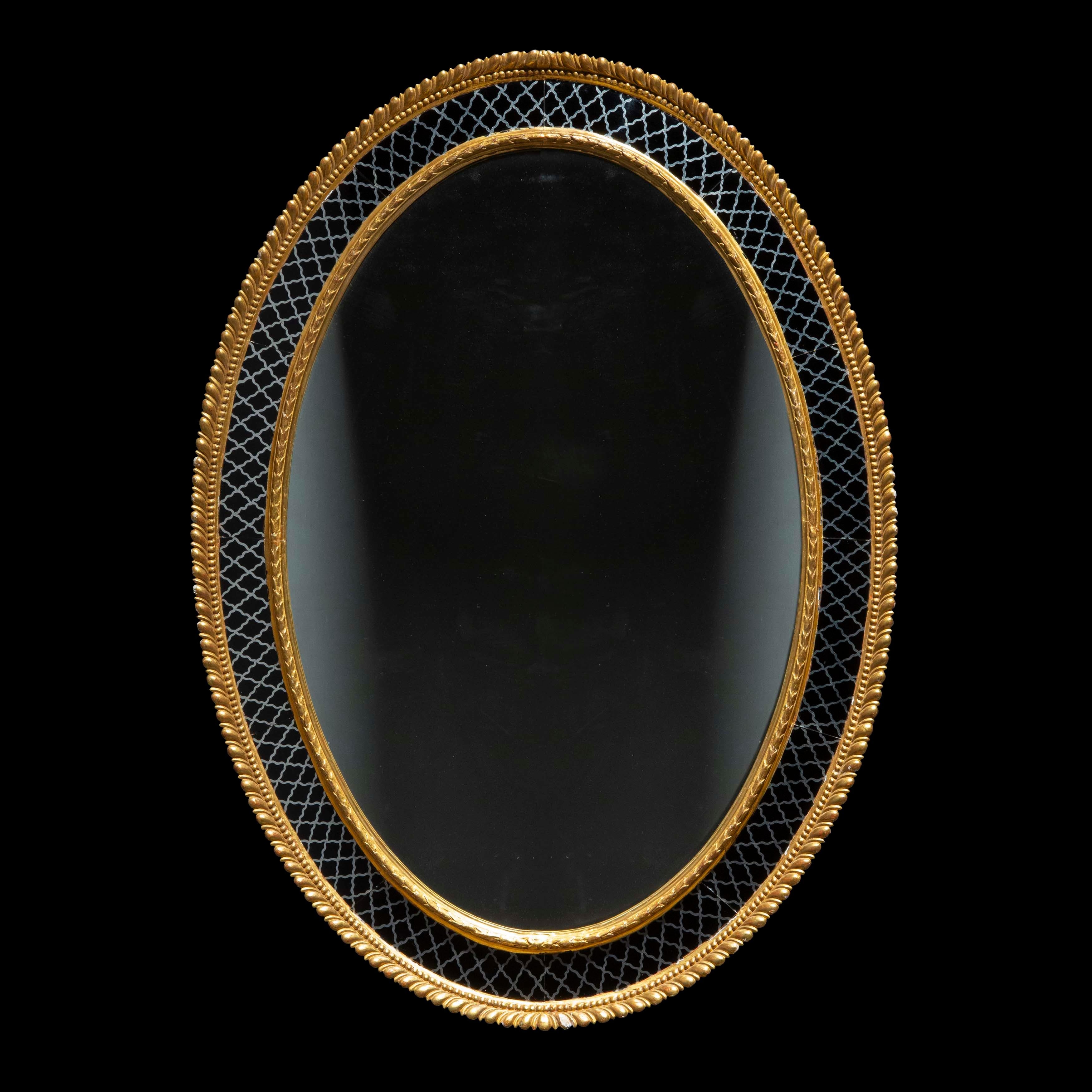 Miroir mural ovale doré de style Régence avec bordure en églomisé en vente 3