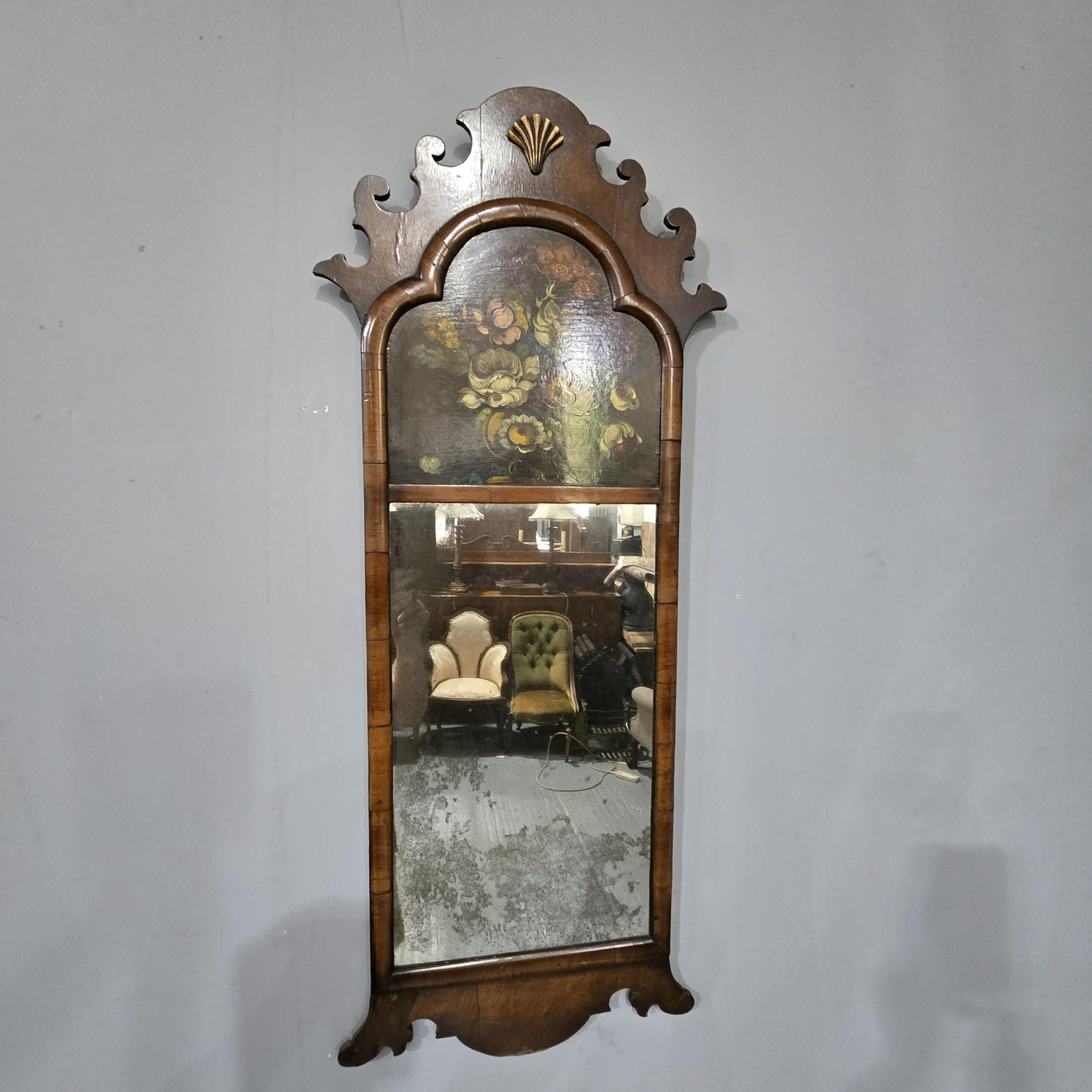 A very good Original Regency painted trumeau mirror in walnut with original mirror.

42