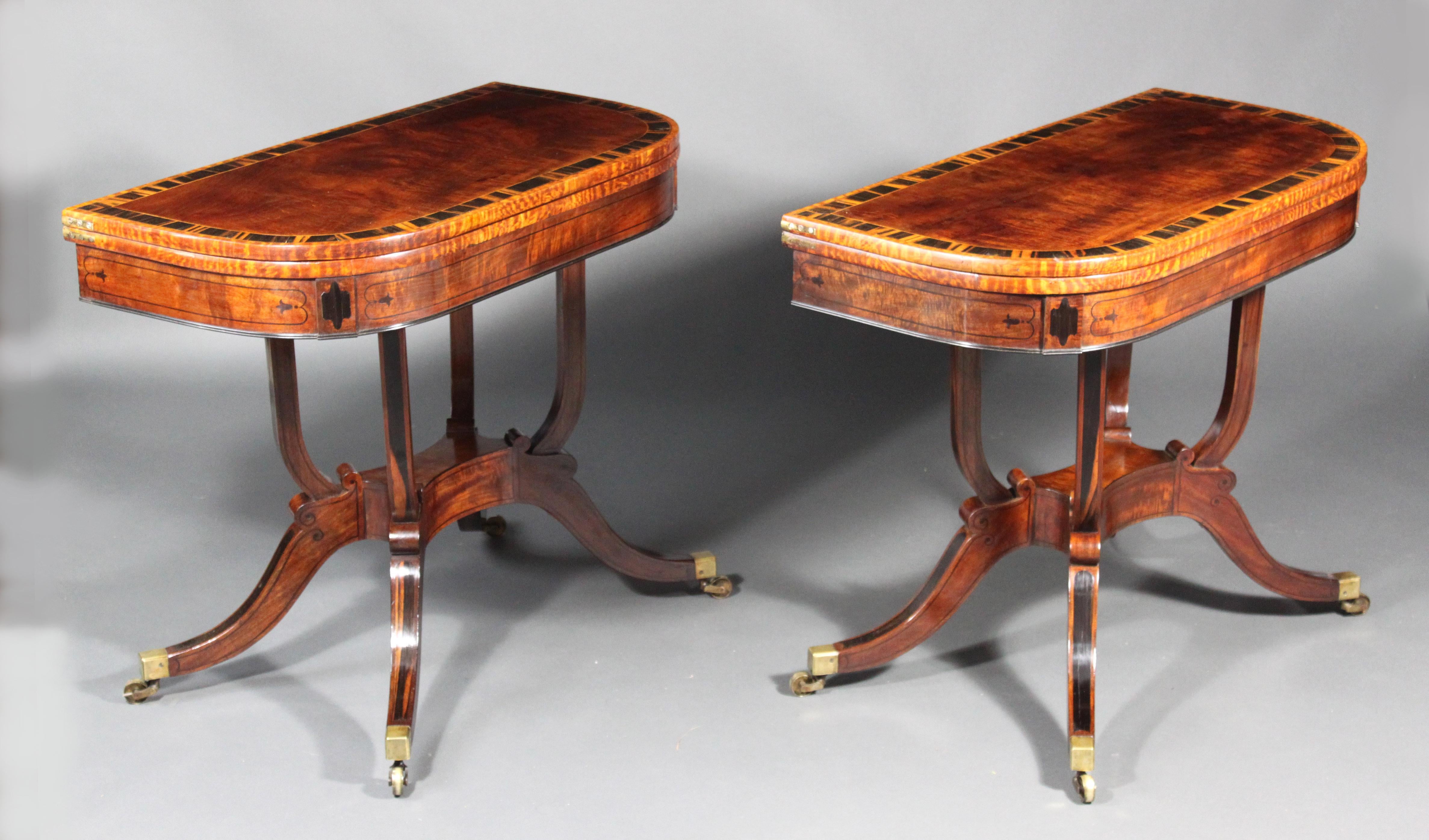A rare and fine set of Regency drawing room furniture comprising a pair of card tables and matching sofa table: made in figured mahogany; the tops with Coromandel and satinwood cross-banding; the frieze with handsome ebony inlay; the bases with