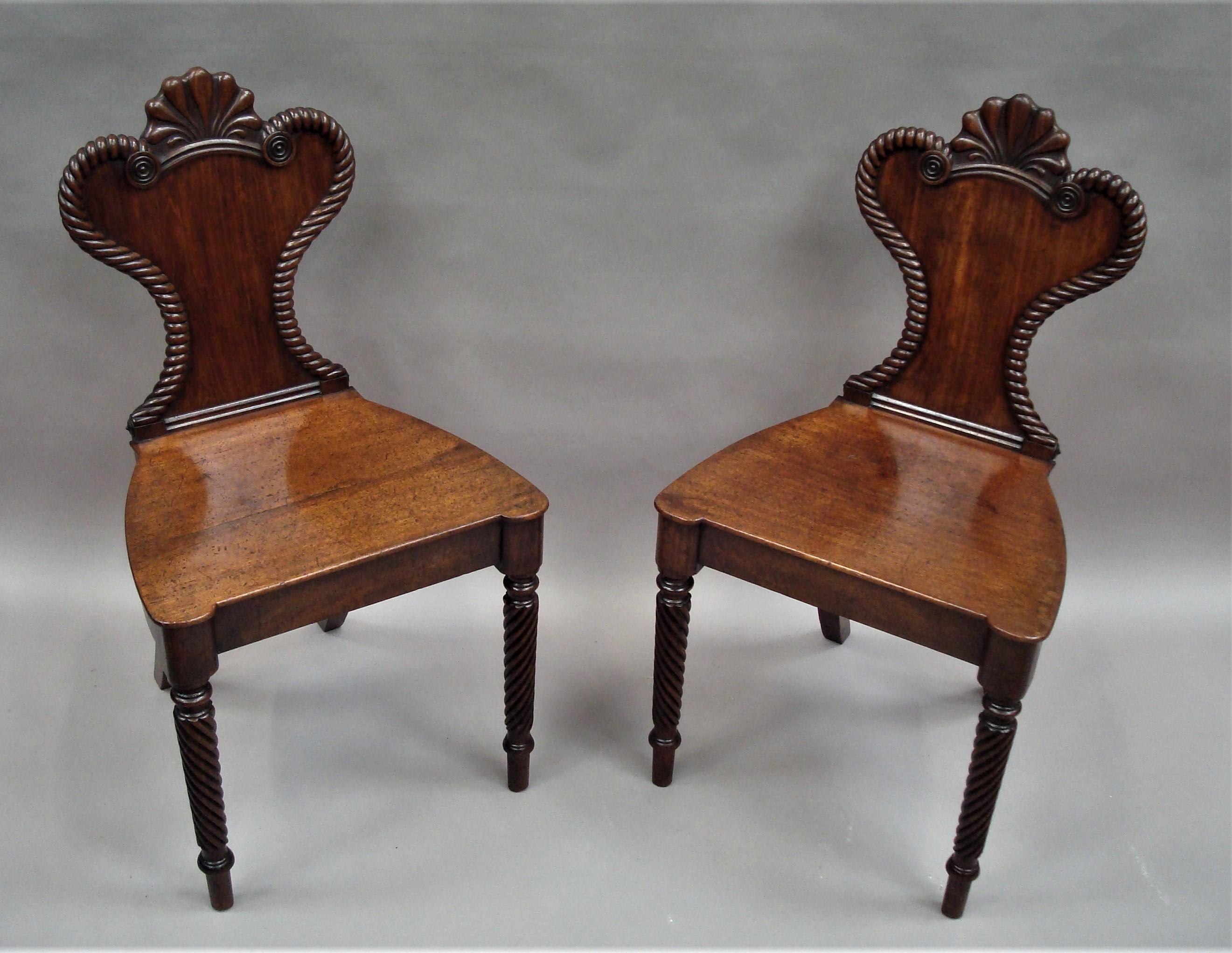 Polished Regency Pair of Mahogany Hall Chairs For Sale