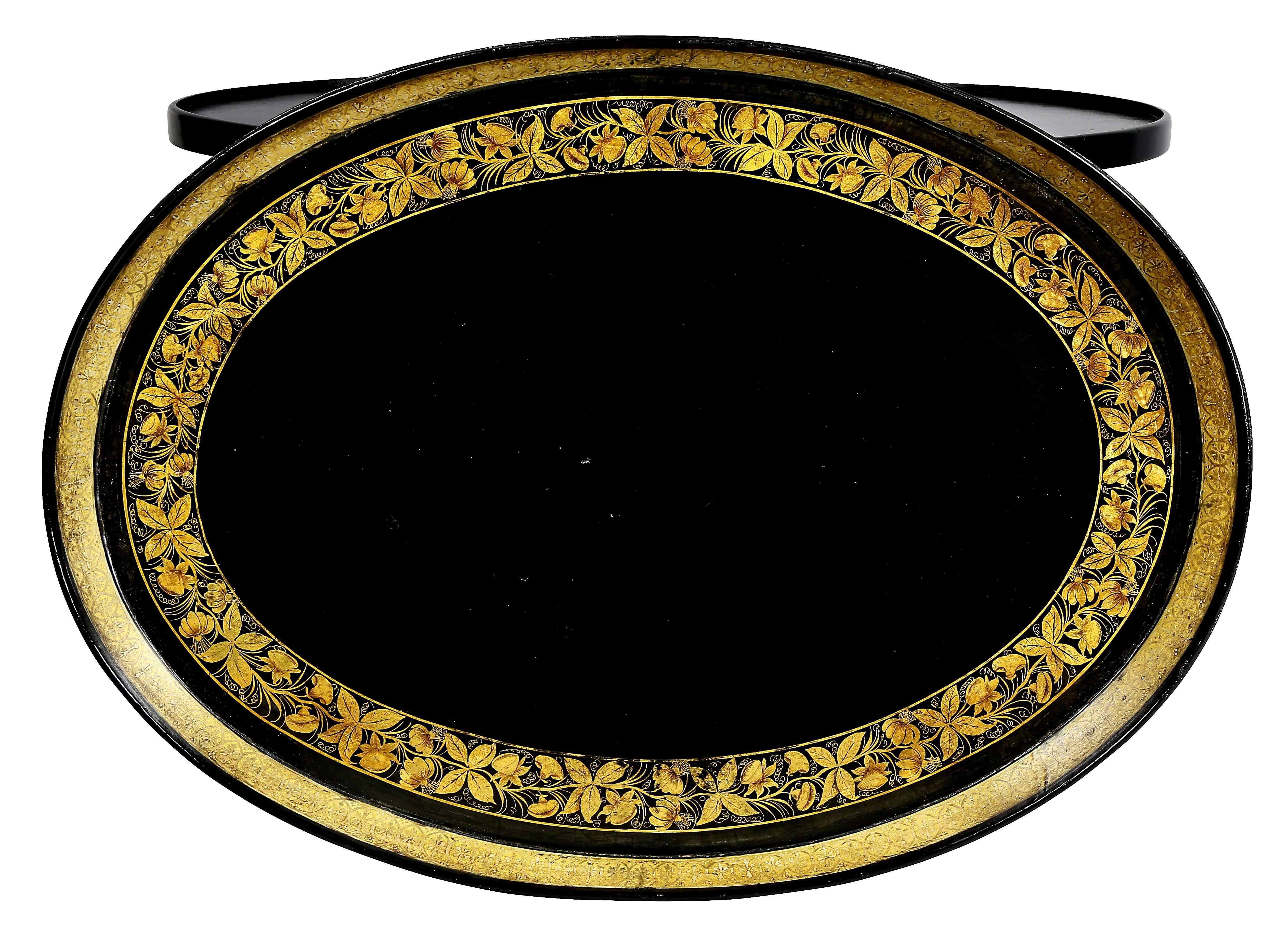 Oval with floral gilt stenciled border, later bamboo turned base.