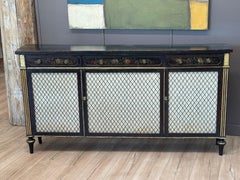 Cabinet de style Régence peint en doré et ébonisé