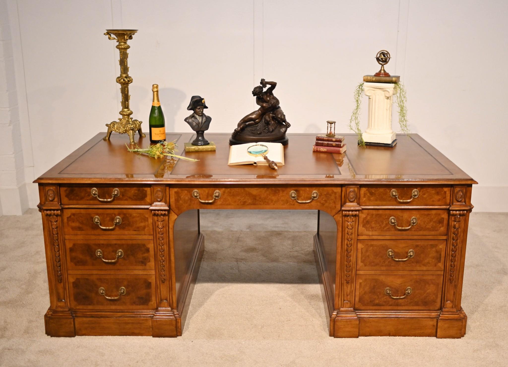 Fantastic large partners desk in the Regency manner
True partners desk with drawers and cupboards on both sides
Features solid oak drawer linings and brass drop handle
Good size so perfect for a home office set up
Large top features a leather