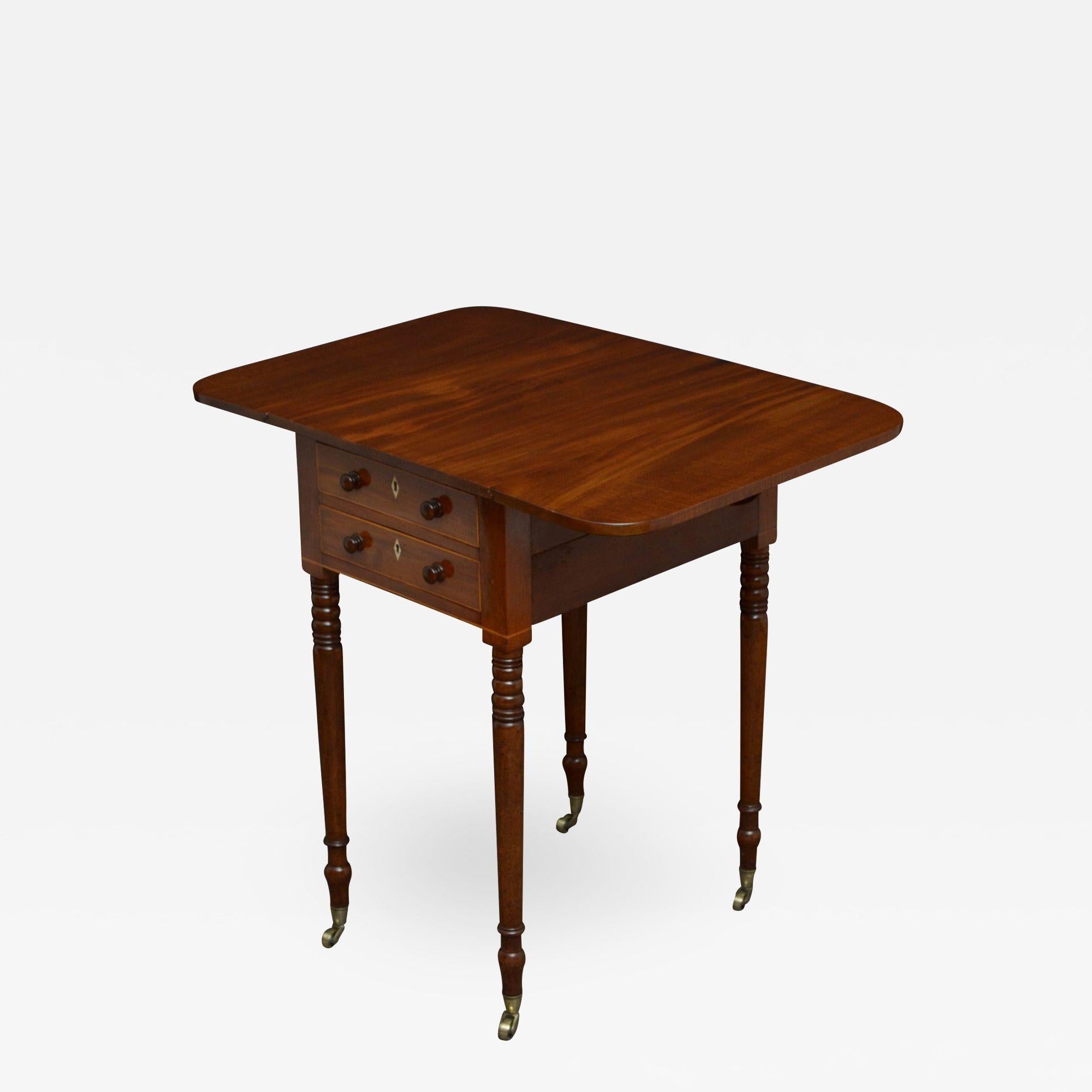 Sn4707 Regency, mahogany, drop leaf occasional table, having figured mahogany top above 2 string inlaid drawer / 2 dummy drawers to opposite side, all fitted with turned handles, raise on elegant turned and ringed legs terminating in original brass